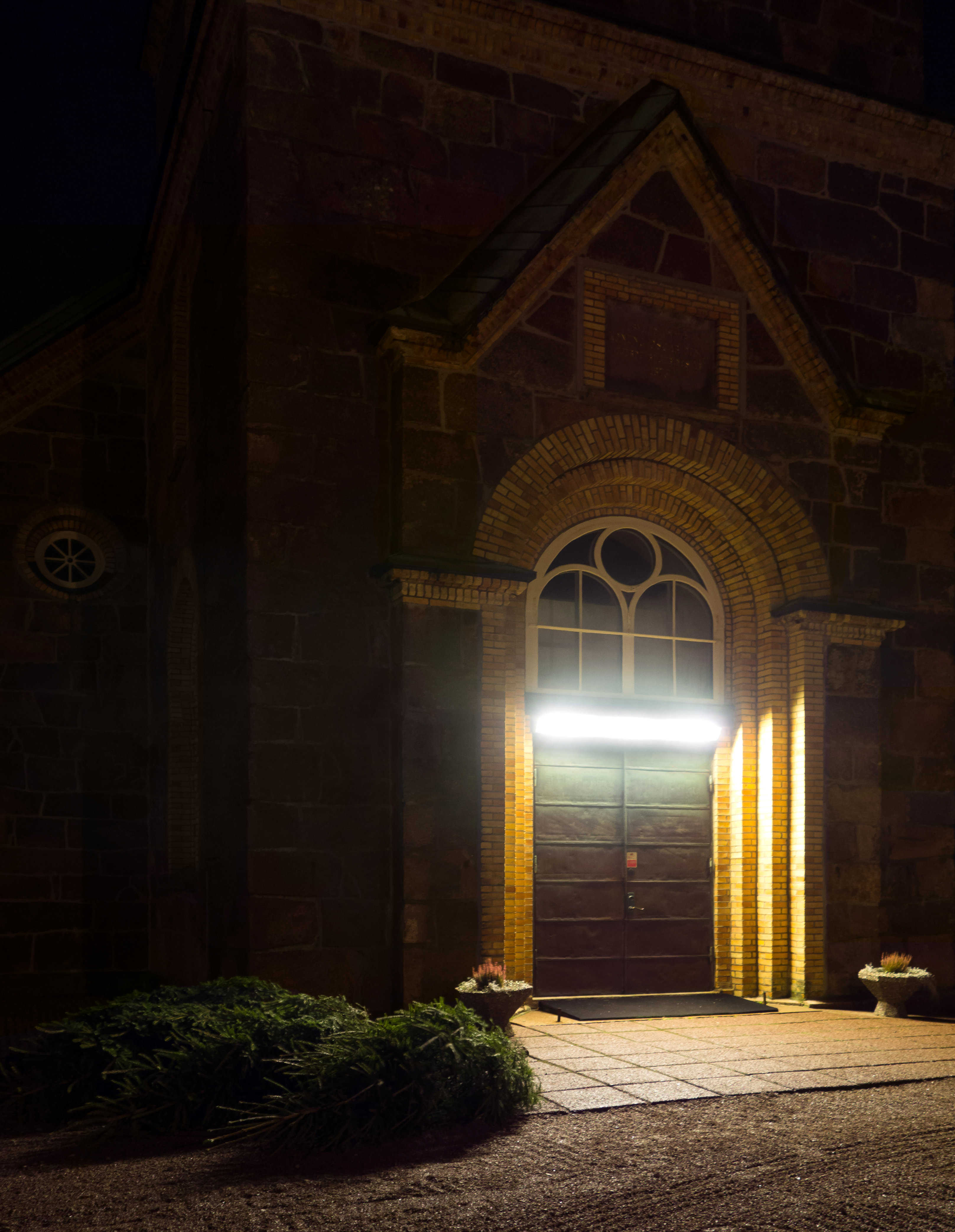 Main entrance brastad church at night 3 photo