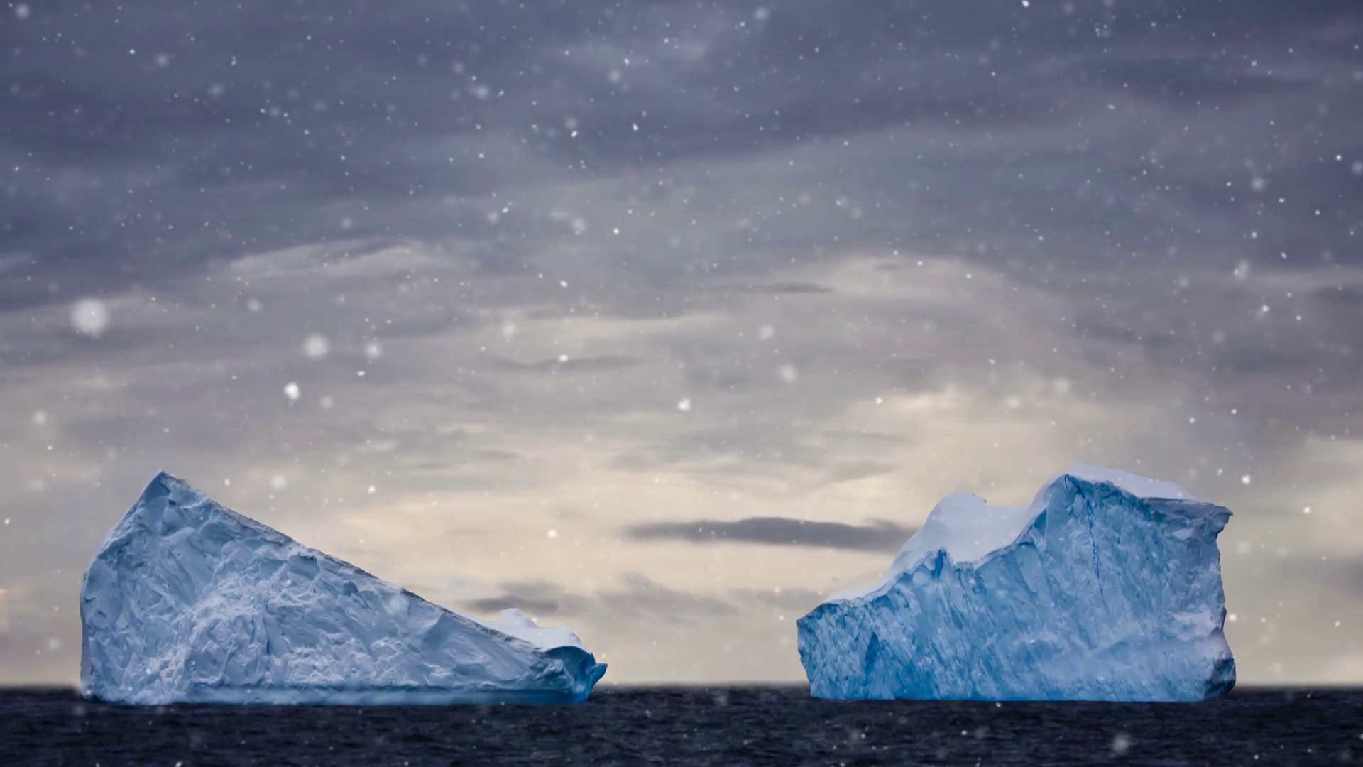 Antarctic Nature. Two big icebergs floating in open ocean, dramatic ...