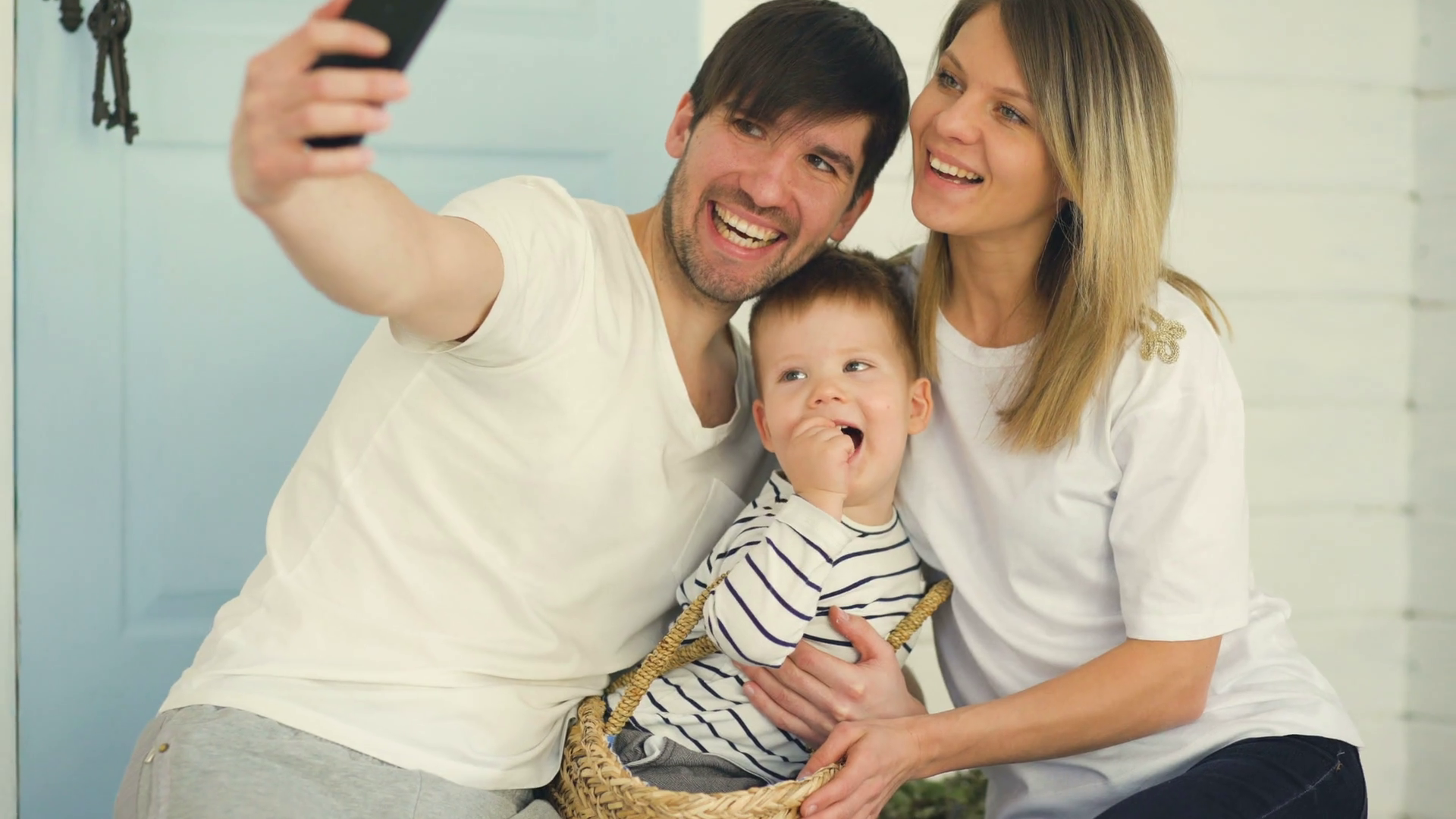 Father of happy family make selfie with his wife and little son in ...