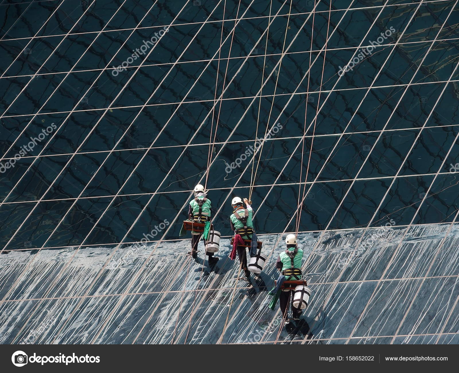 men clean glass building by rope — Stock Photo © whity2j@yahoo.com ...