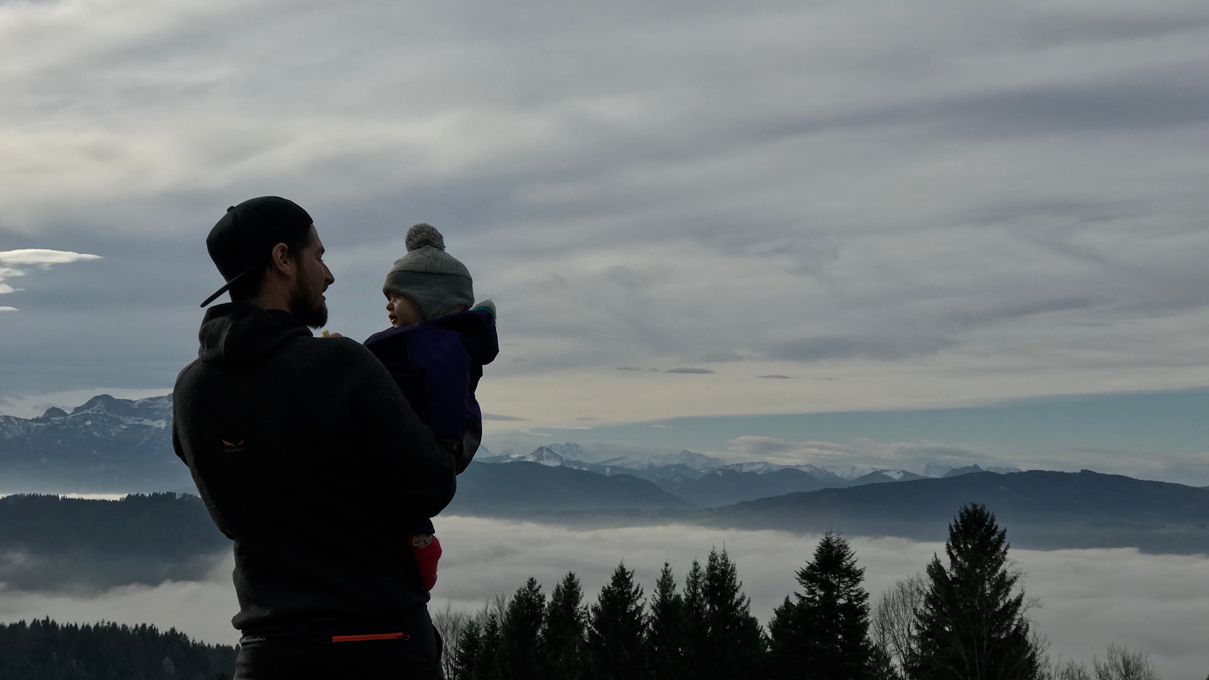 Man Holding a Baby Photo, Baby, Mountain range, Trees, Snow, HQ Photo