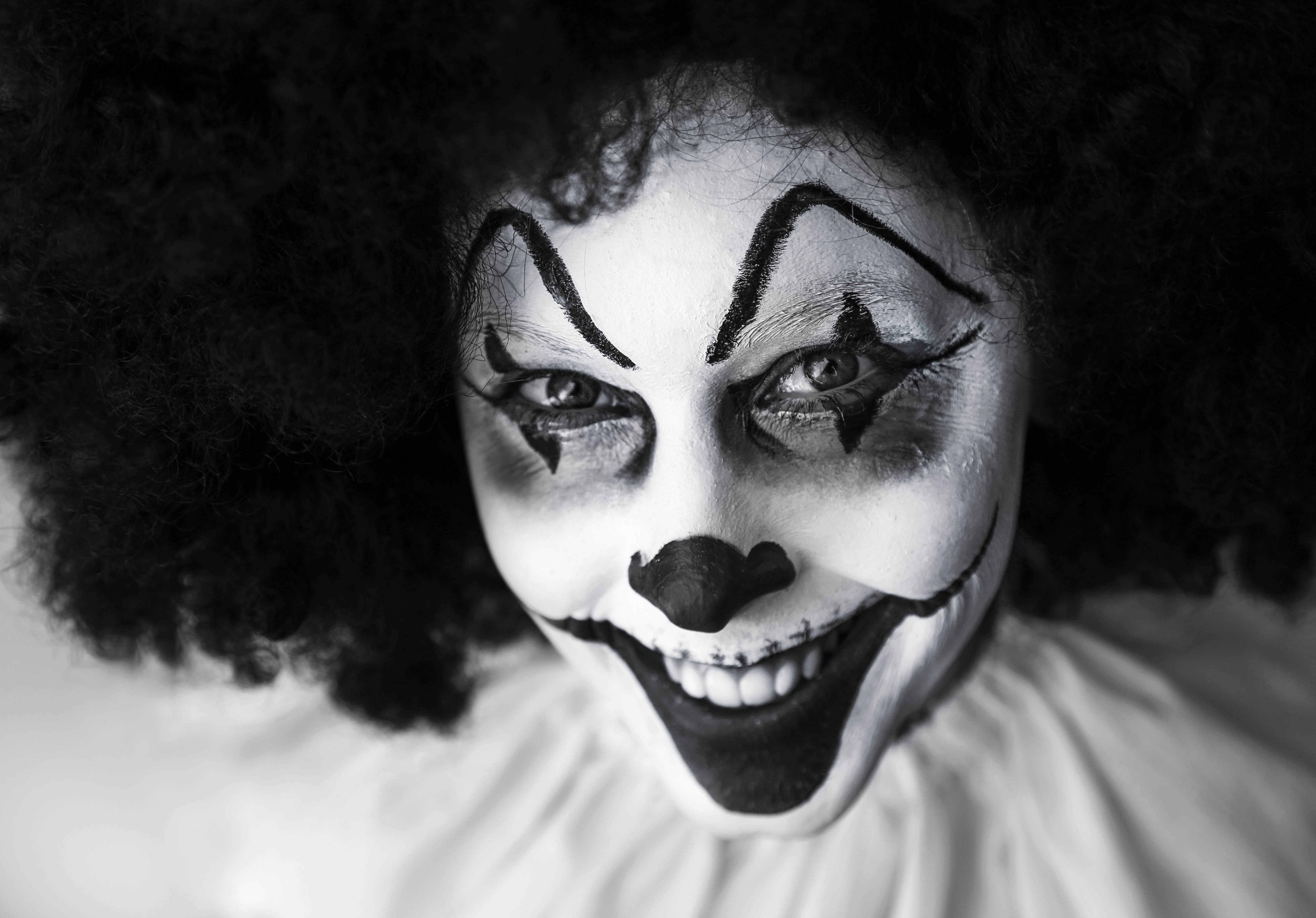 Man in clown costume photo