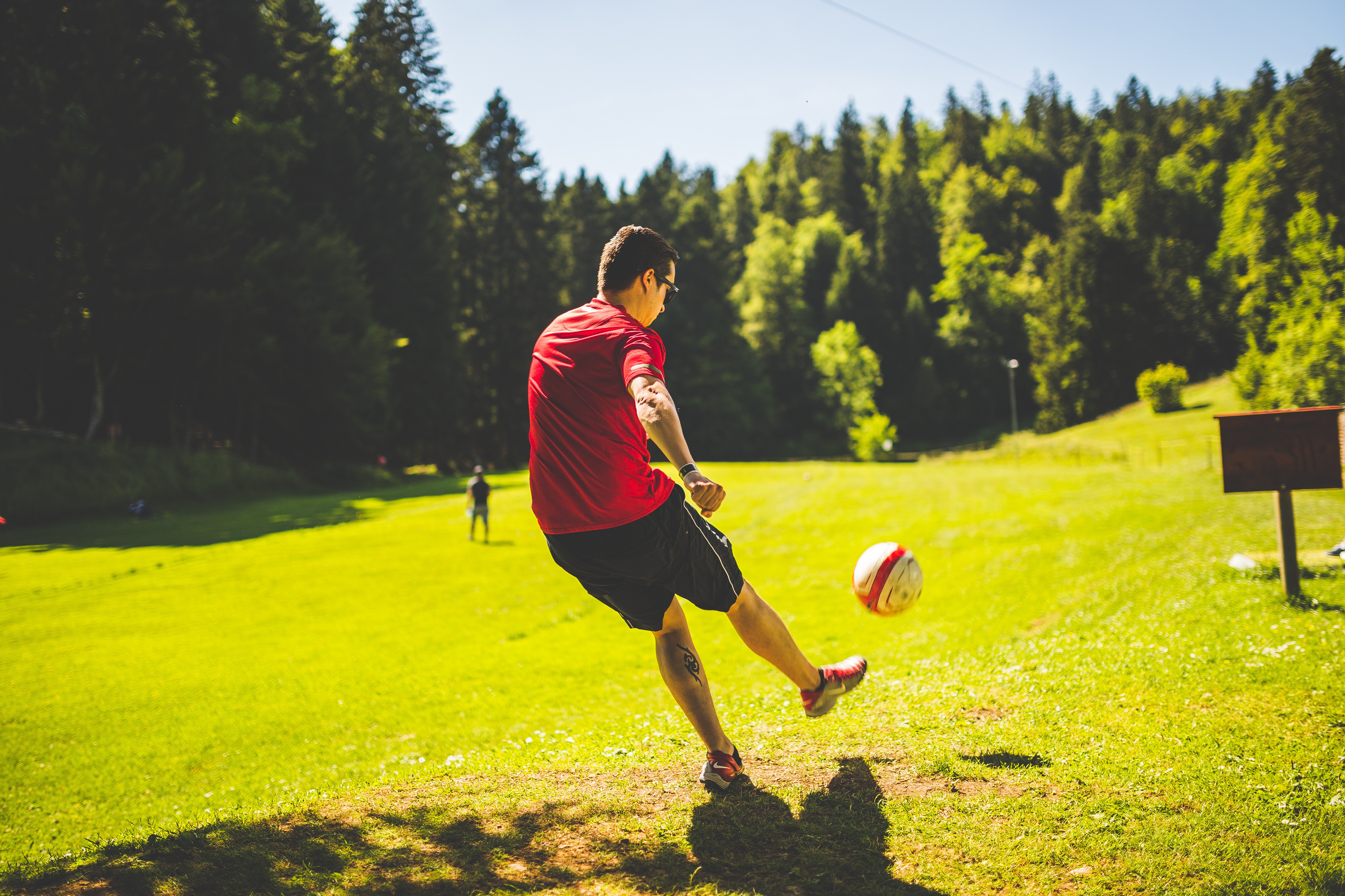 Man in Red T Shirt Playing Soccer during Daytime, Ball, Football, Game, Park, HQ Photo