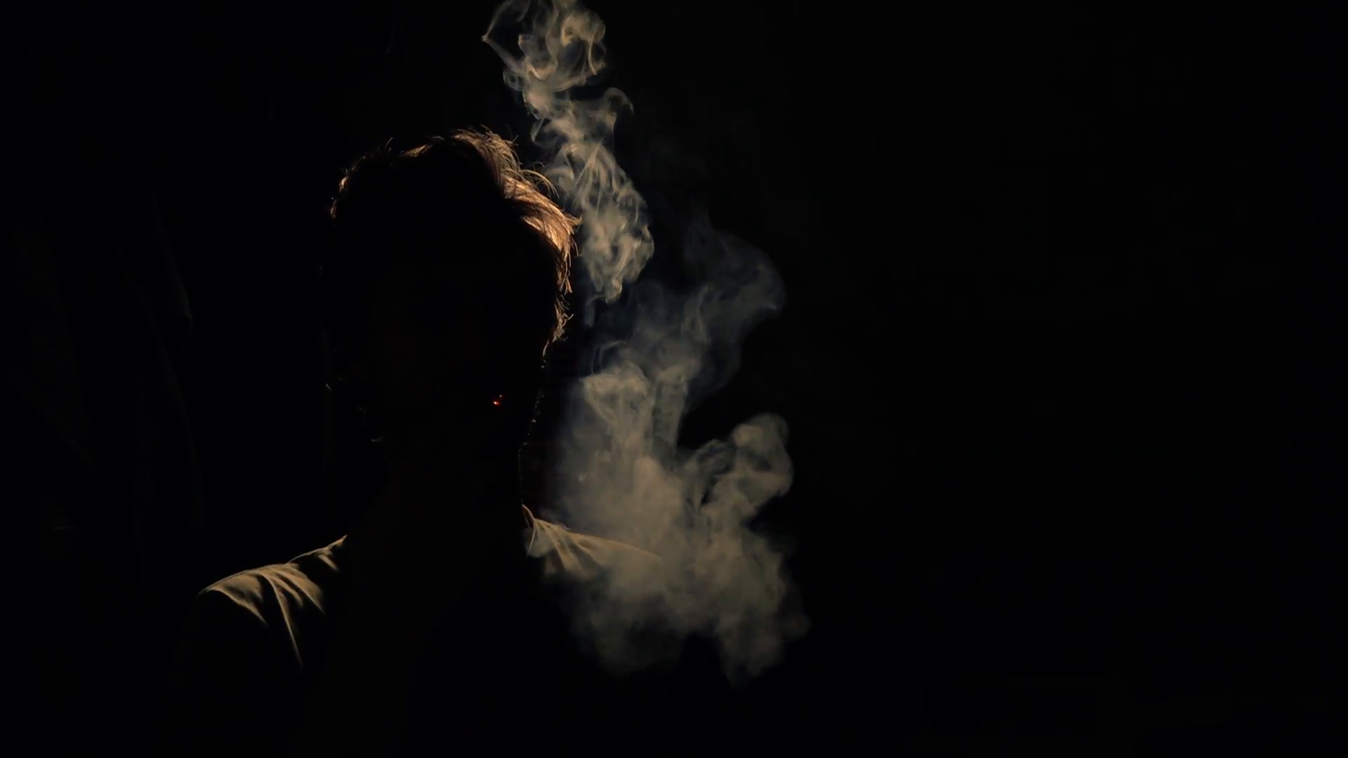 Back lit silhouette man smoking compulsively Stock Video Footage ...