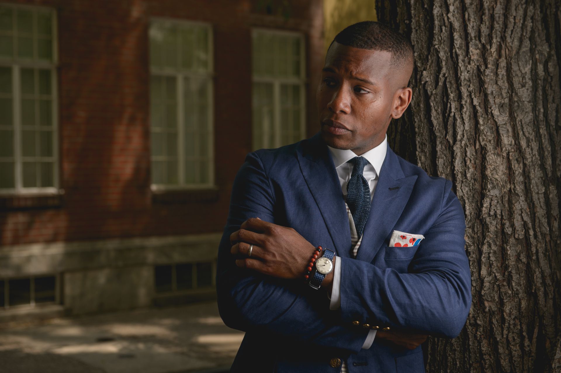 Why some American black men are dressing in suits to survive