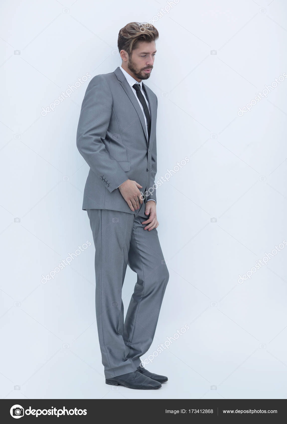 side view of an arrogant stylish man in suit — Stock Photo ...
