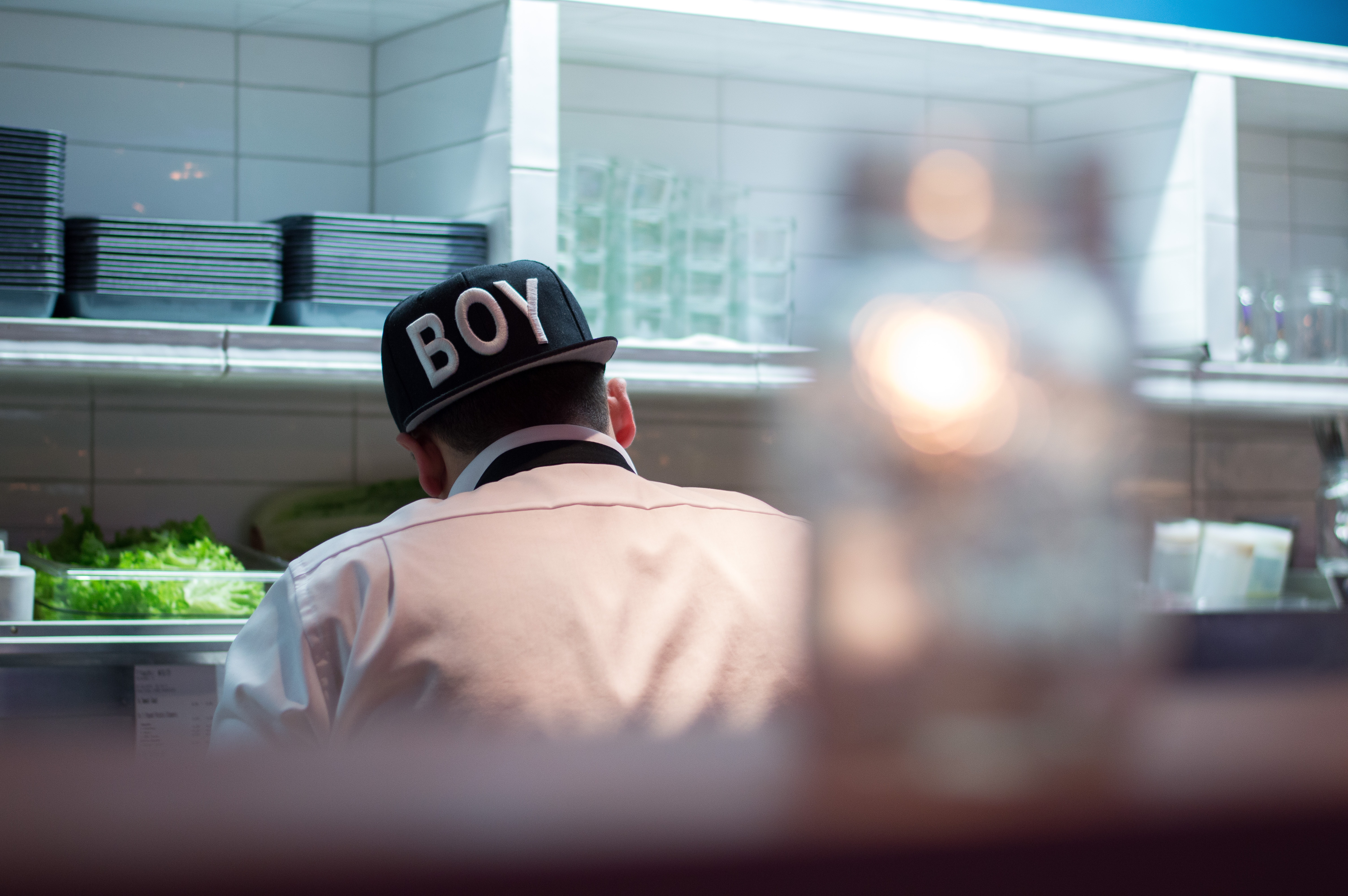 Man in White Button Up Shirt Wearing Boy Printed Black and White Fitted Hat, Cap, Chef, Cook, Cooking, HQ Photo