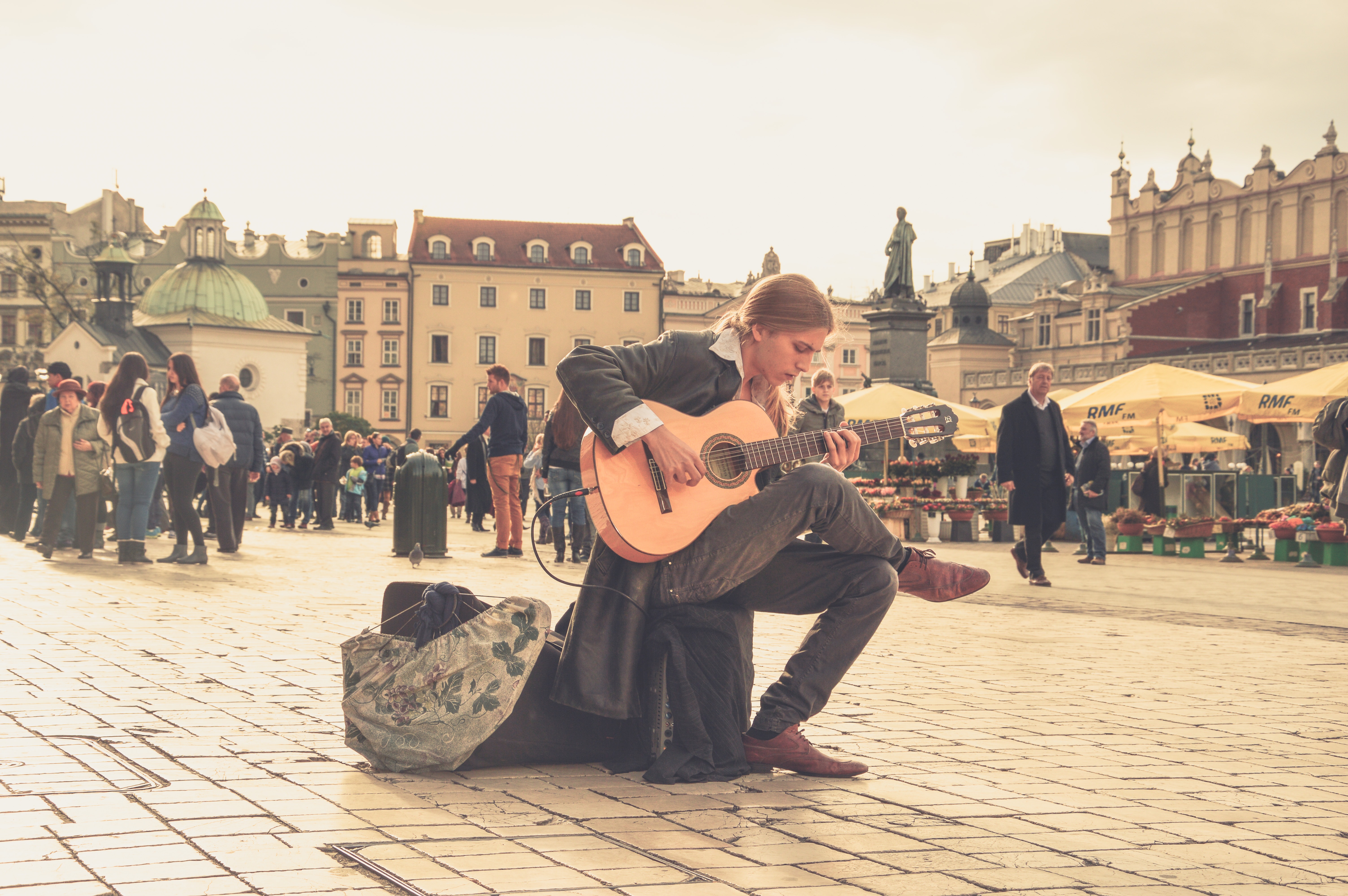 Man playing acoustic guitar photo