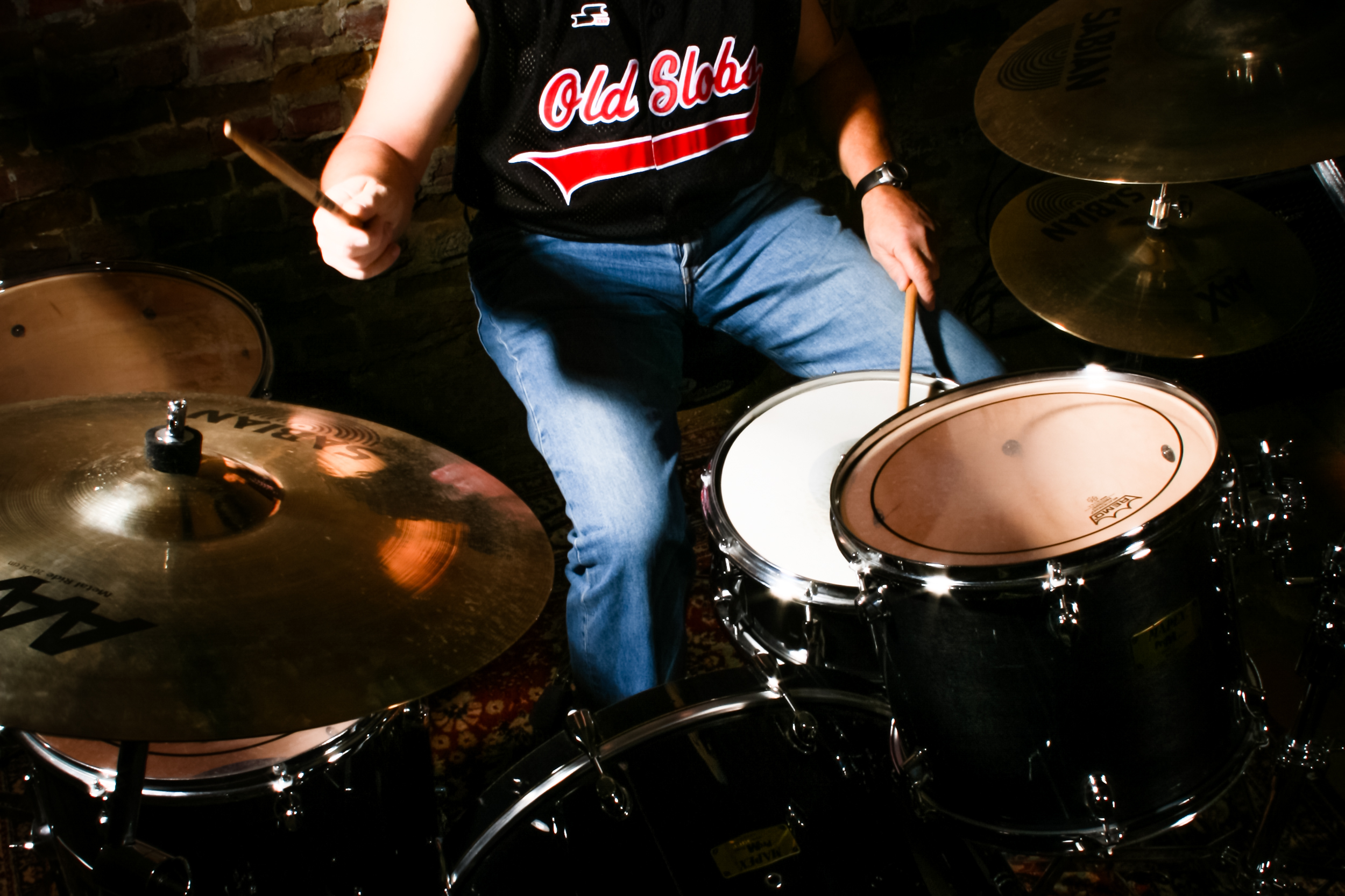 Man playing drums instrument photo