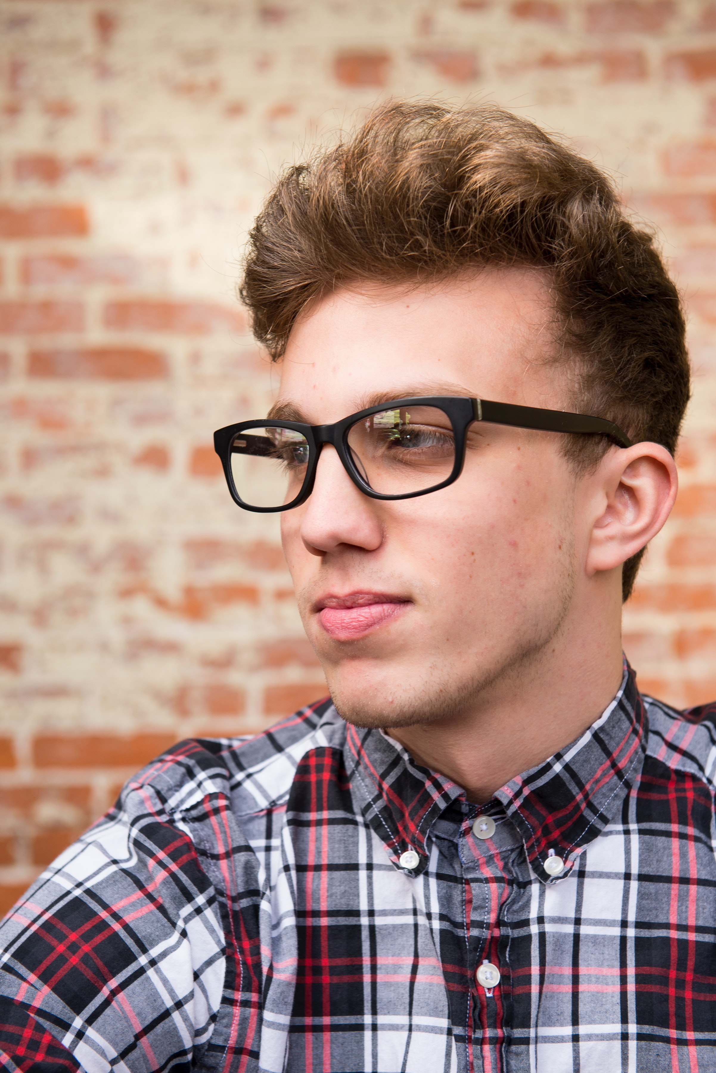 Man wearing black framed eyeglasses photo