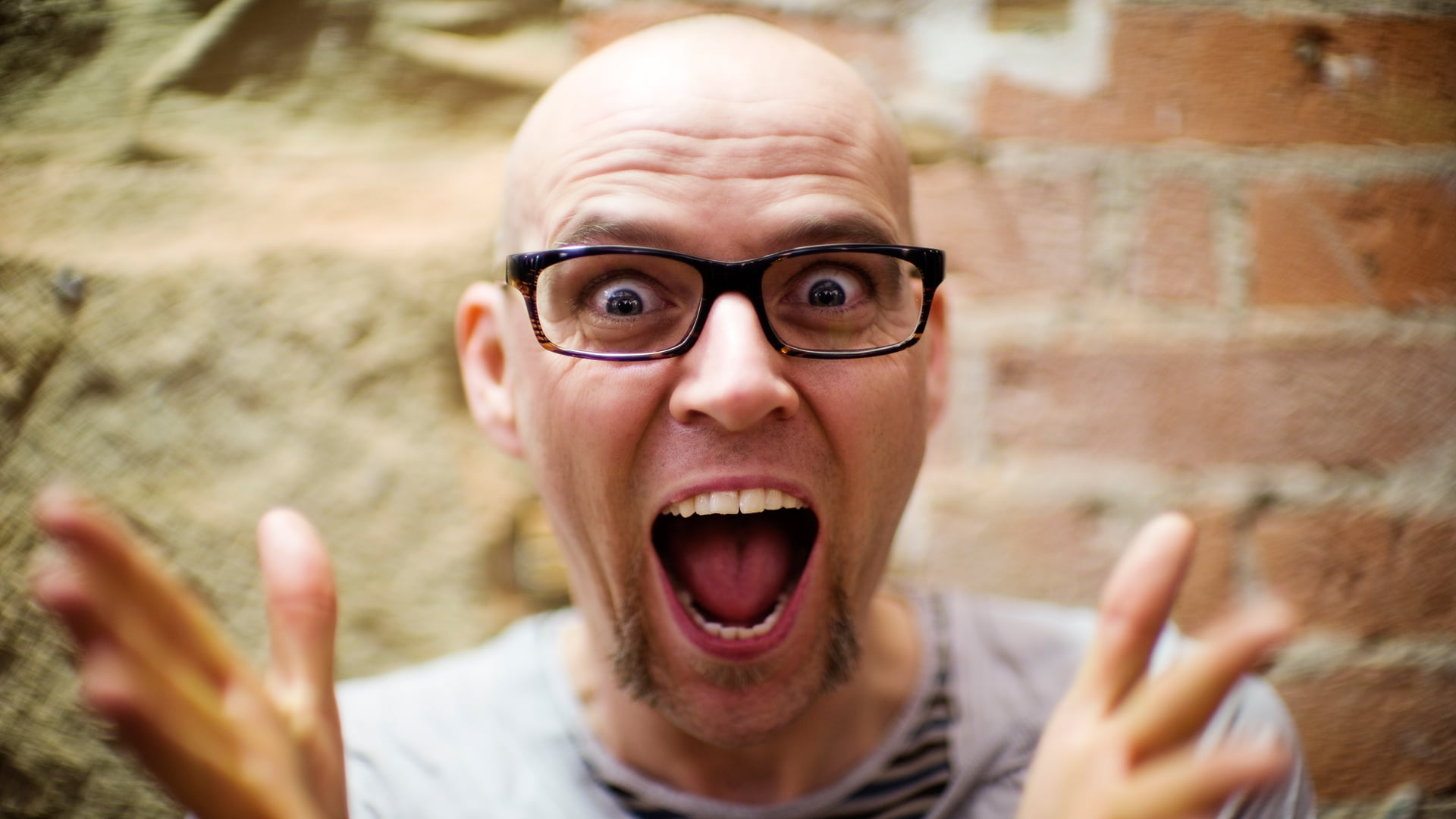 Man wearing eyeglasses showing surprised expression HD wallpaper ...