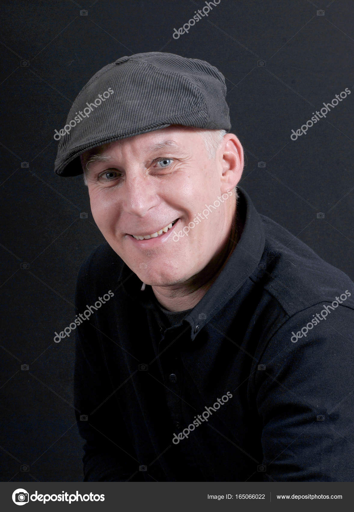 Portrait of mature man with cap — Stock Photo © philipimage #165066022