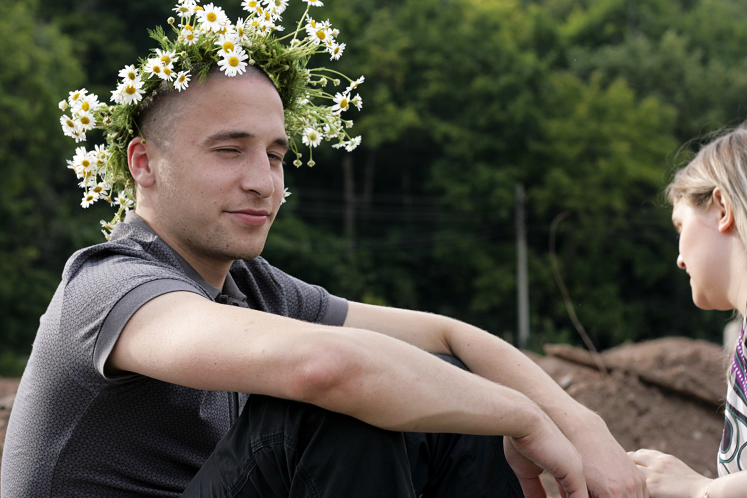 Man with flower crown photo