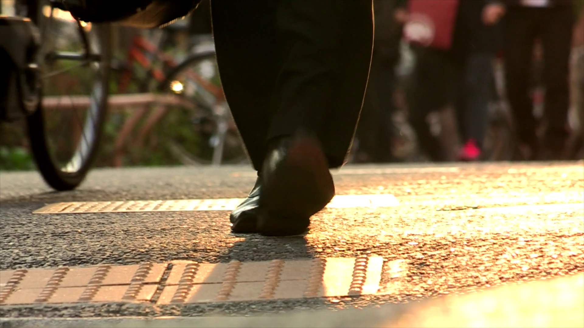 Closeup Of Businessman's Feet Walking In The Street Long Lens Shot ...