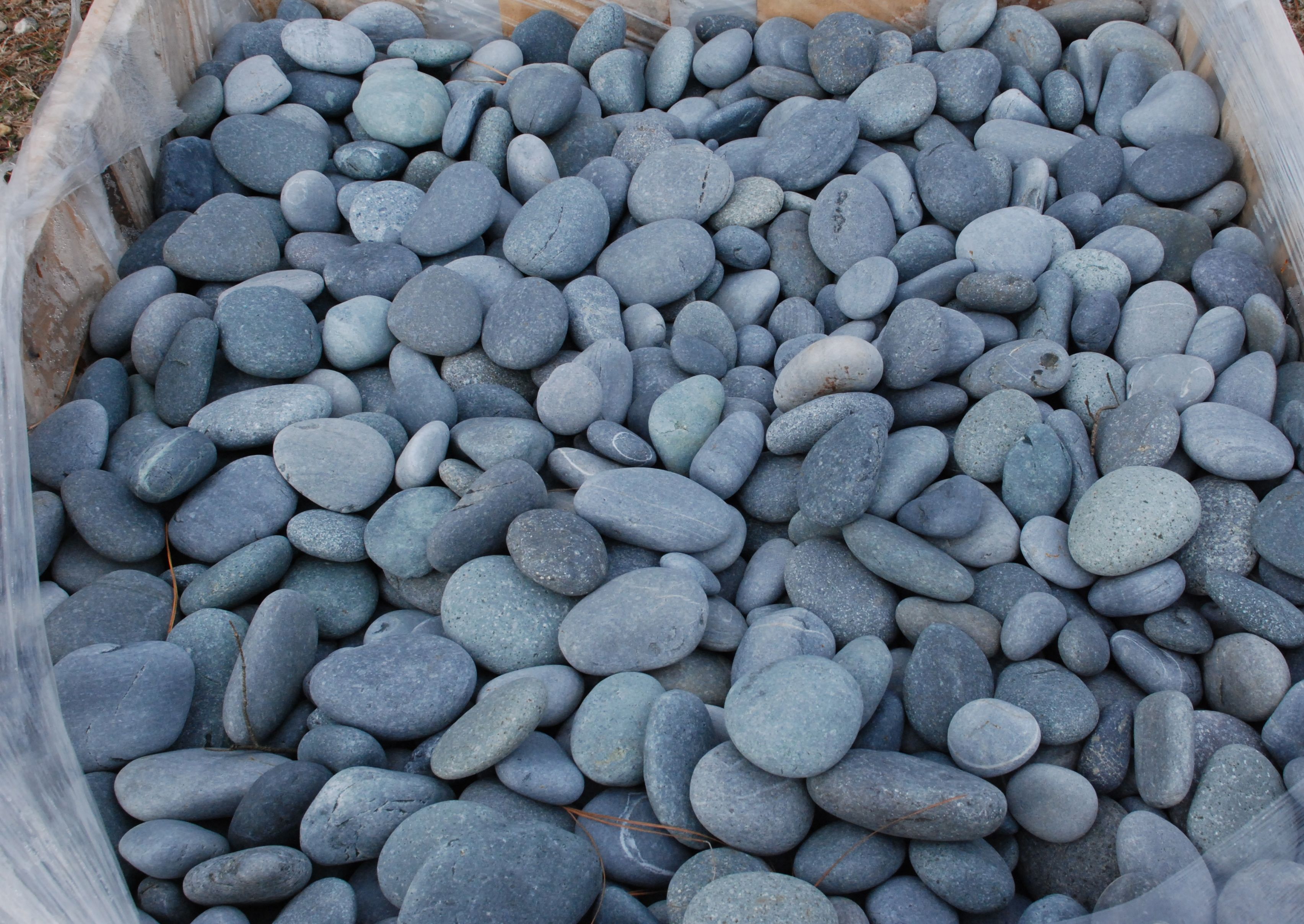 Many black pebbles photo