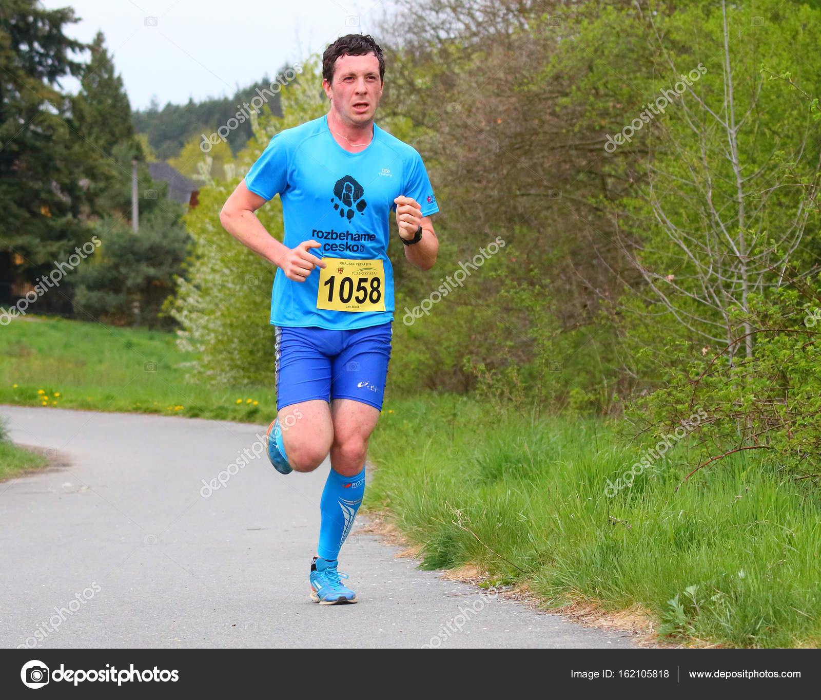 Half marathon runner – Stock Editorial Photo © vladvitek #162105818