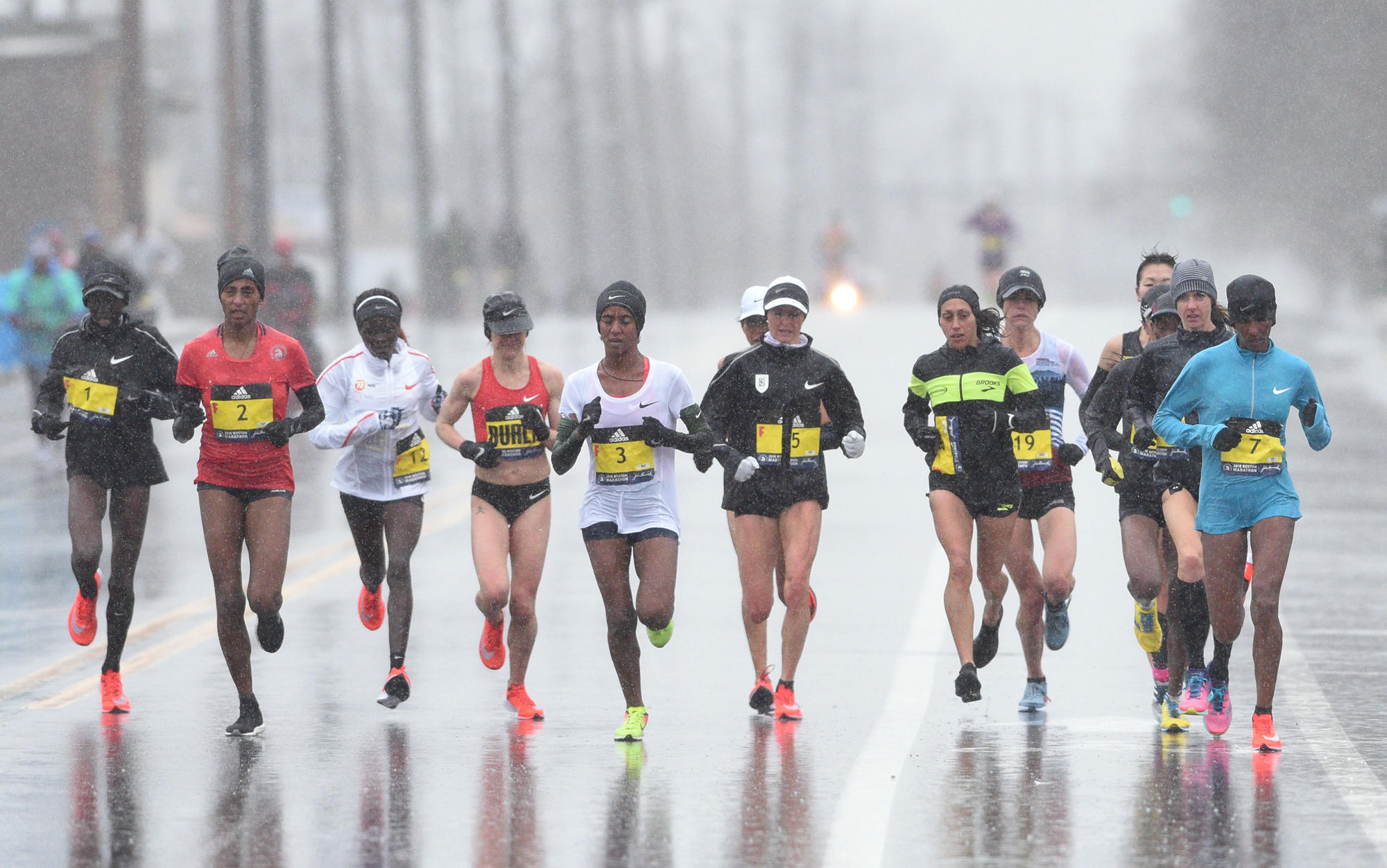 Boston Marathon runners, fans showered with nasty conditions ...