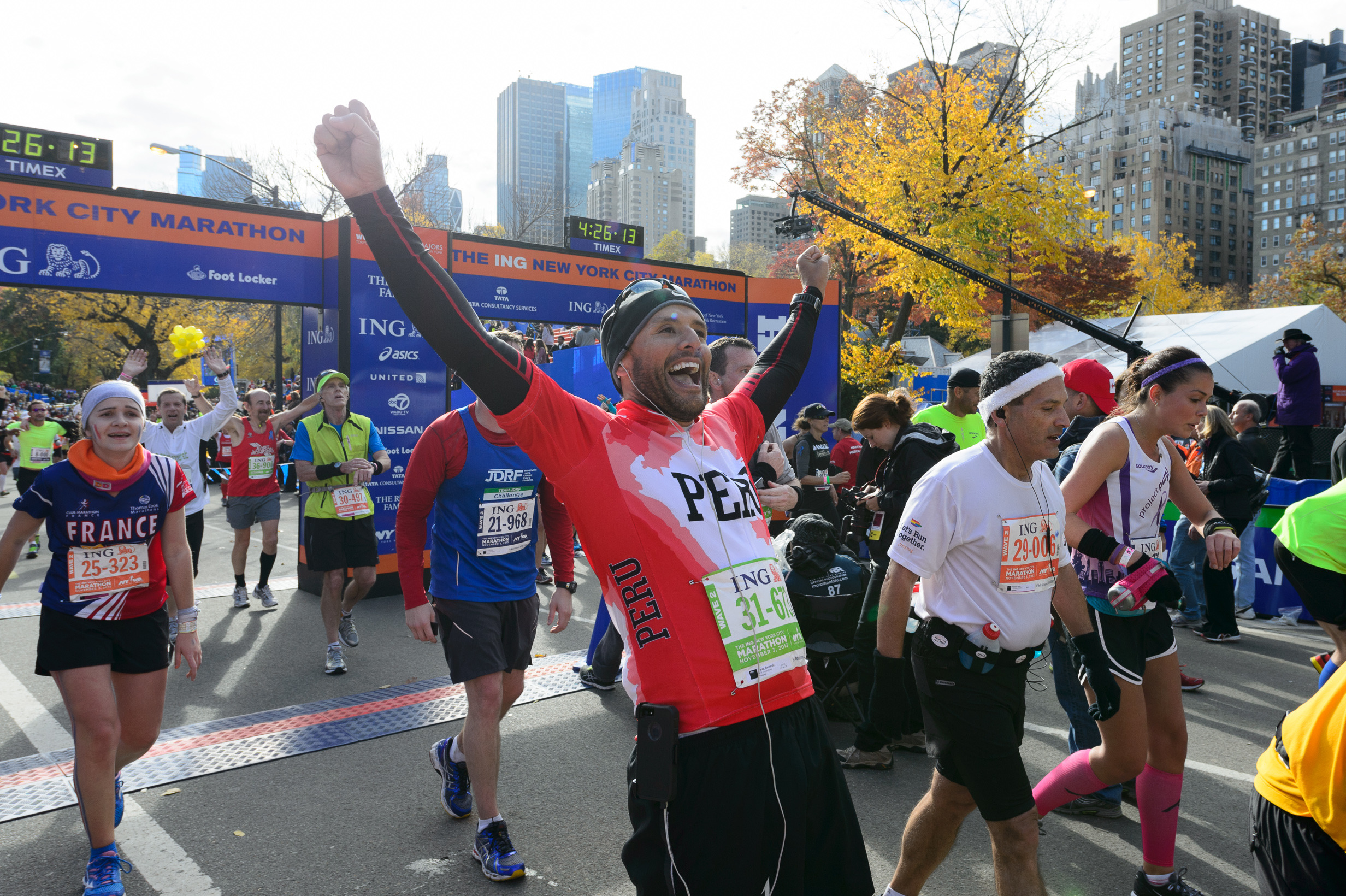 Watch NYC Marathon runners cross the finish line (slide show, video)