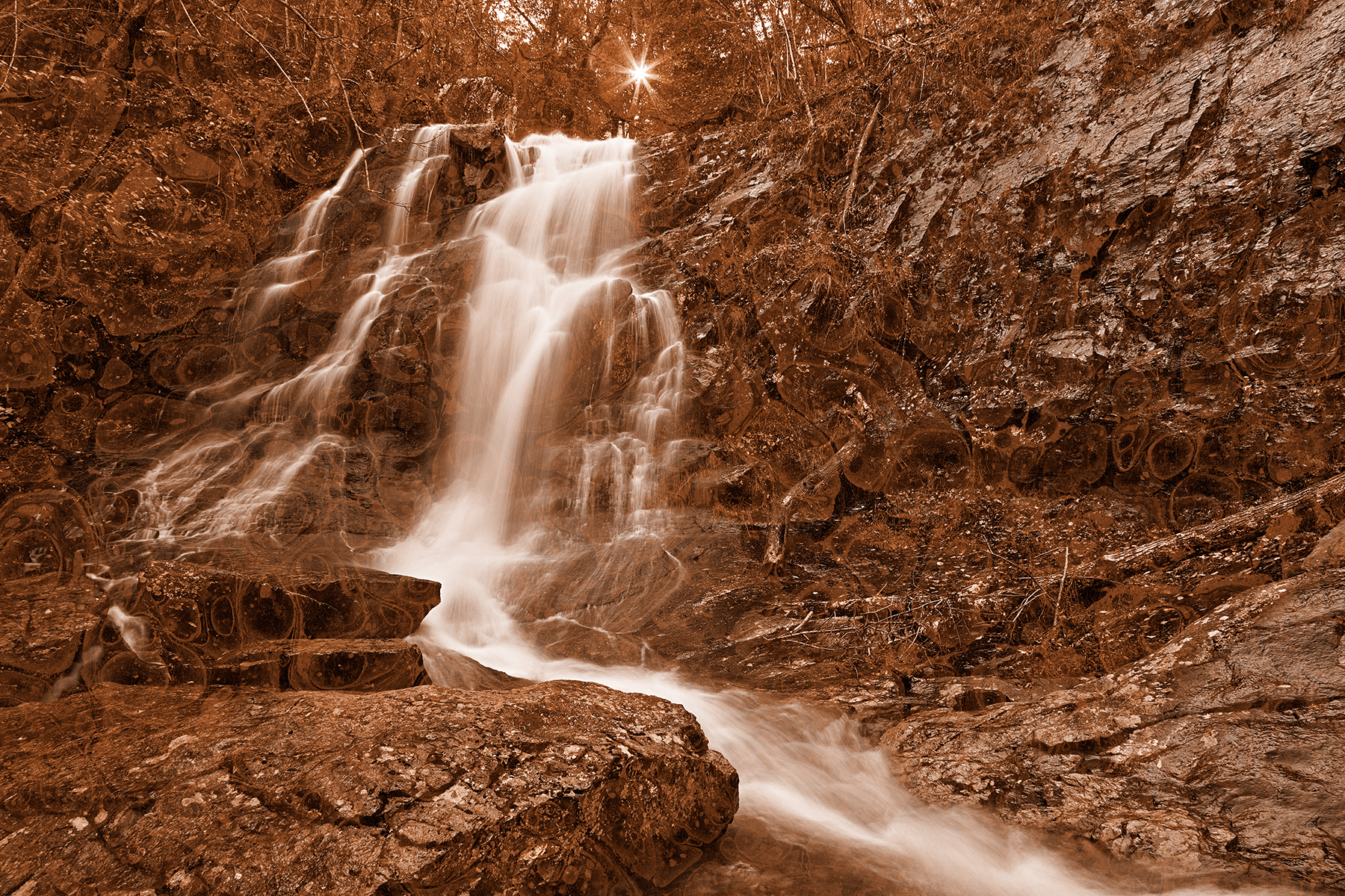Marbled sunset waterfall - sepia nostalgia photo