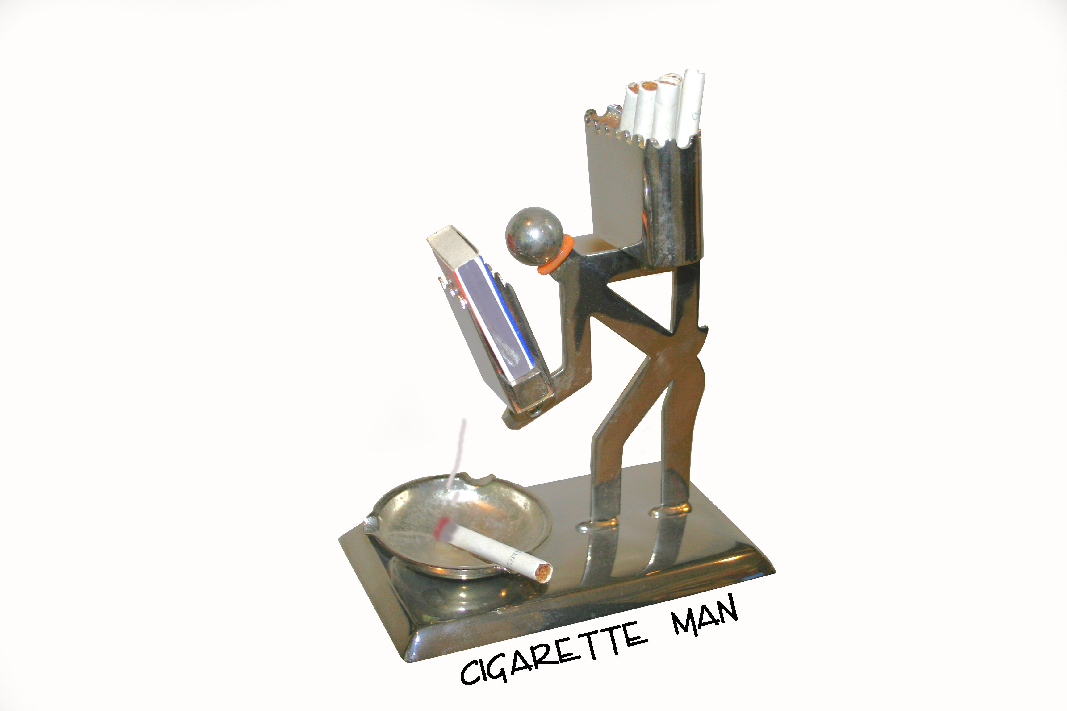Smoking - Chrome figure featuring a match, cigarette holder and ash ...