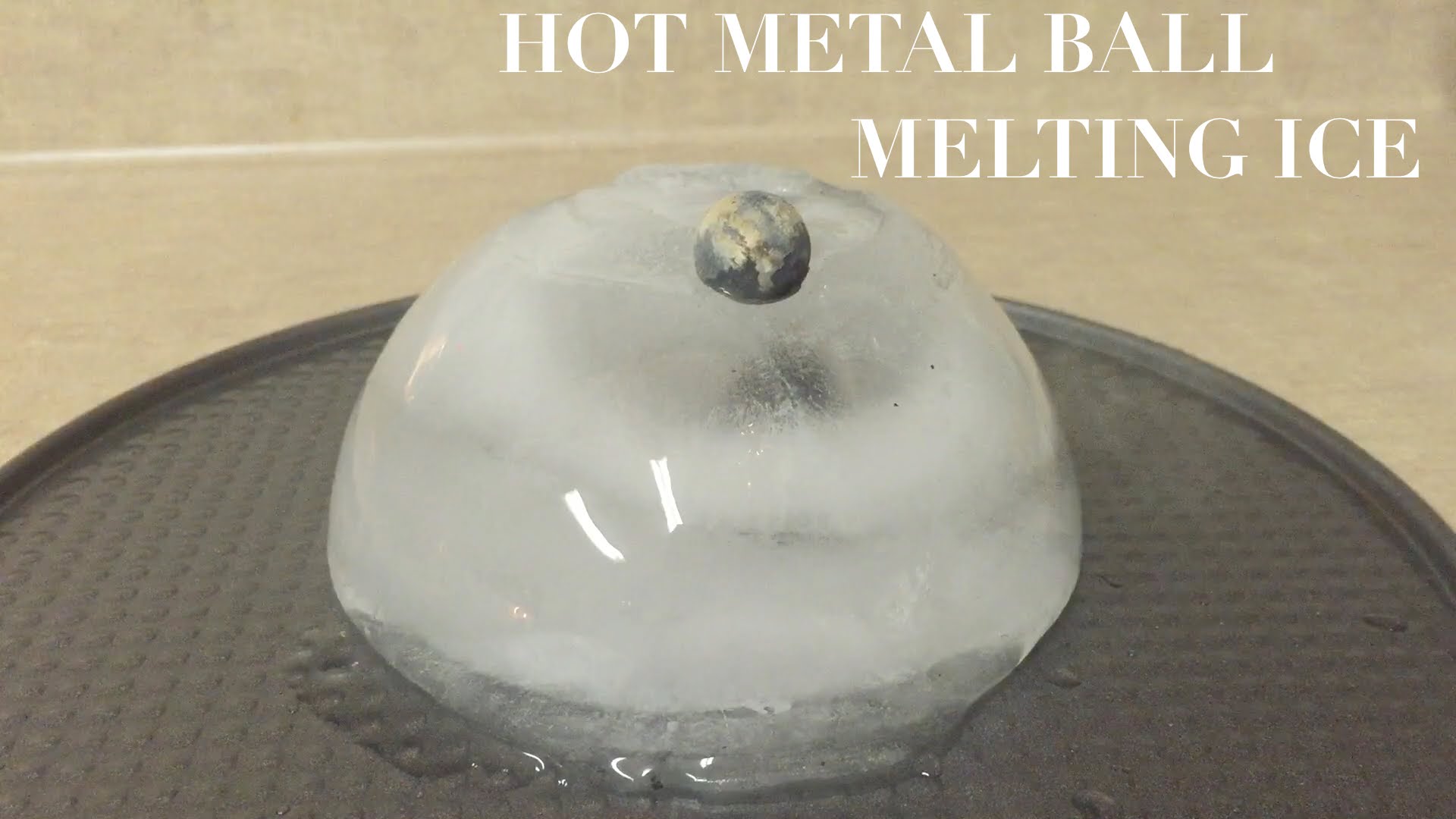 Hot Metal Ball Melting Ice - YouTube