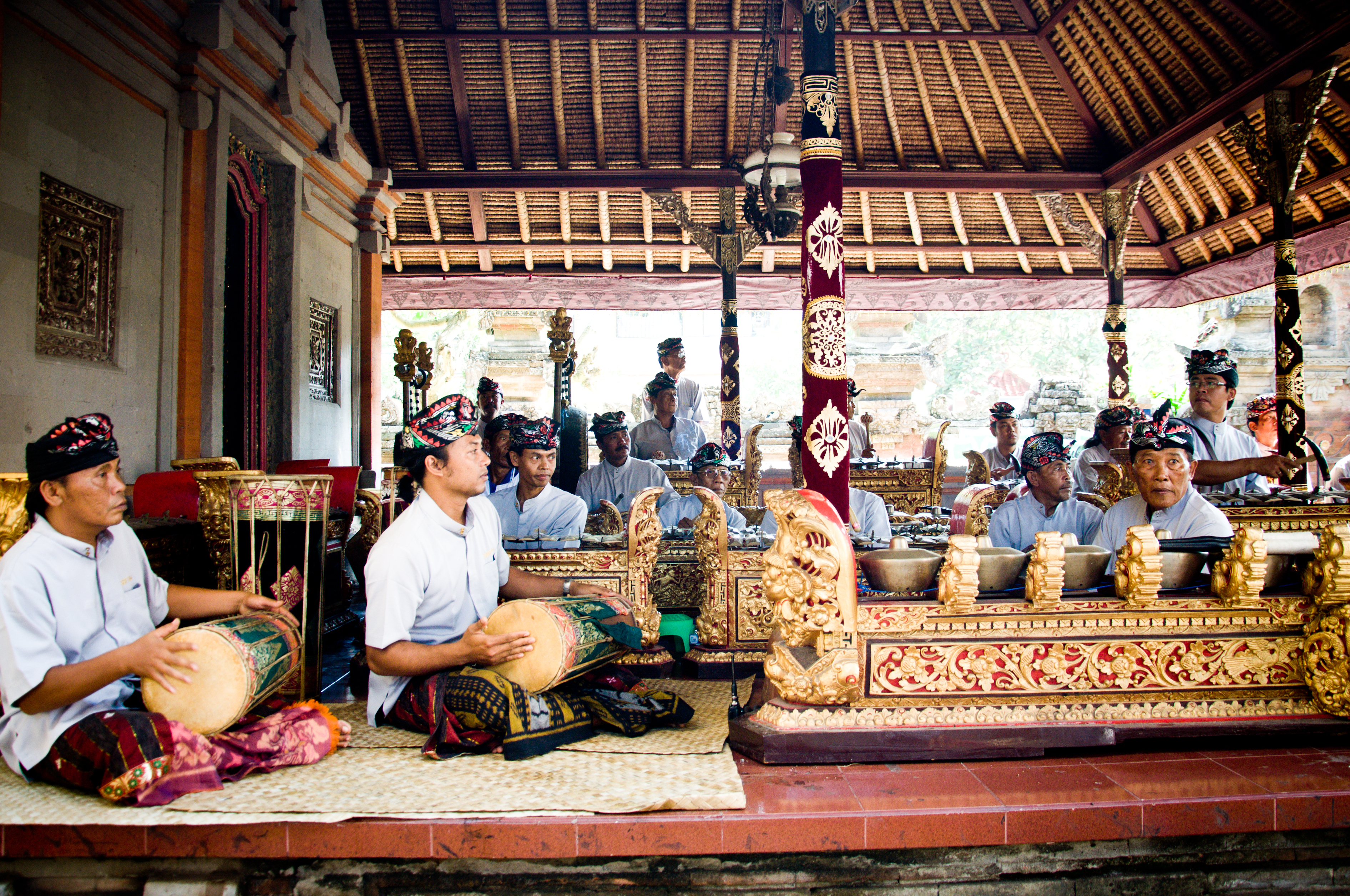 Men play traditional gamelan percussion photo