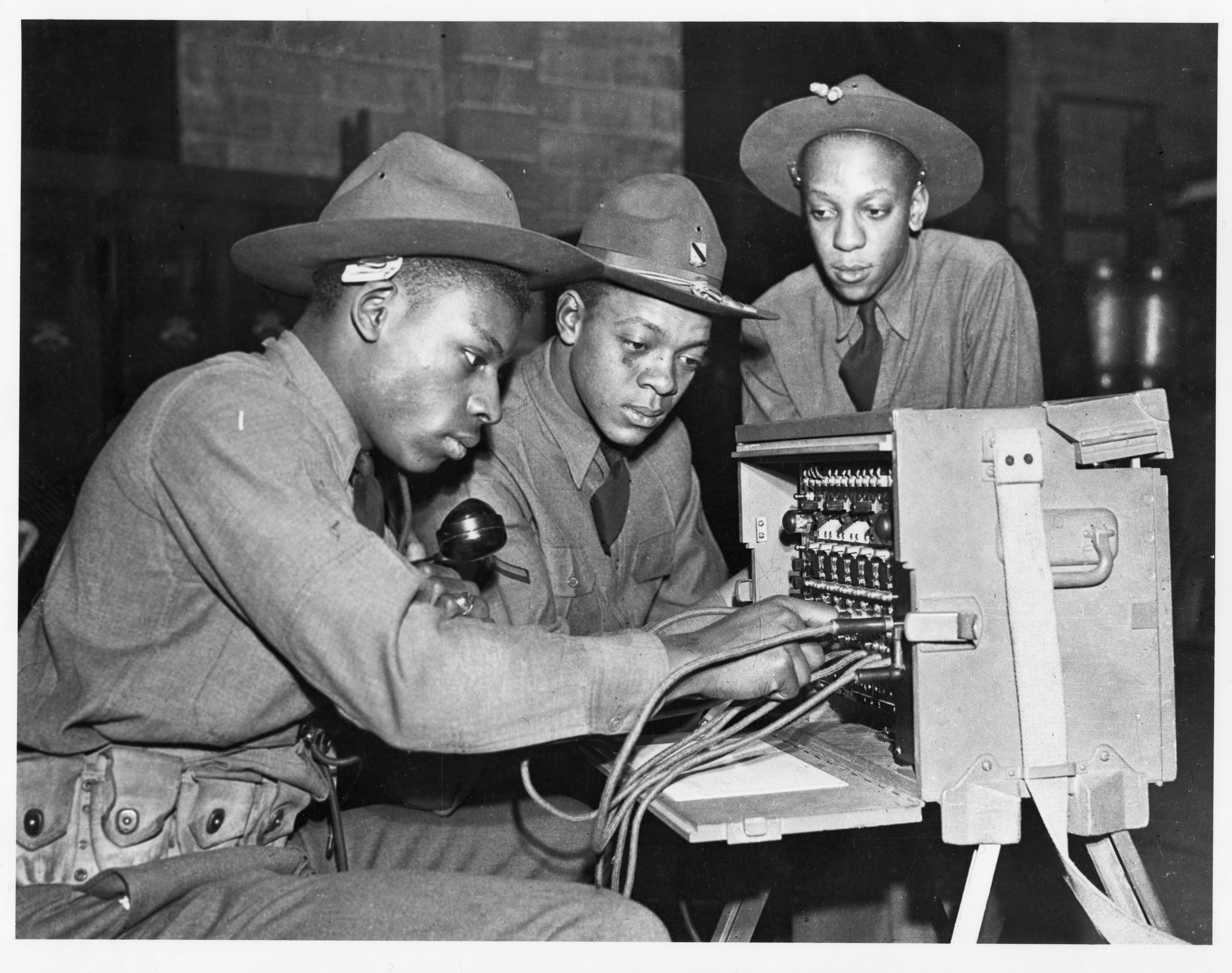 File:3 men working on a portable phone switchboard.jpg - Wikimedia ...