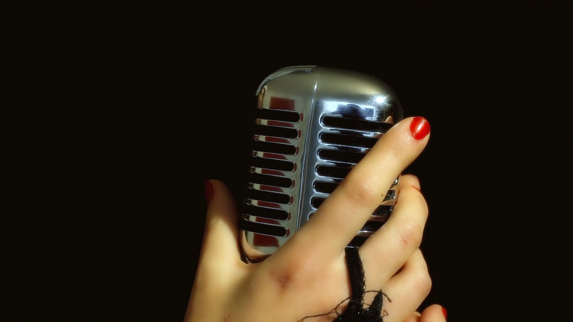 Music microphone female hands touch. The beautifully seductive hands ...
