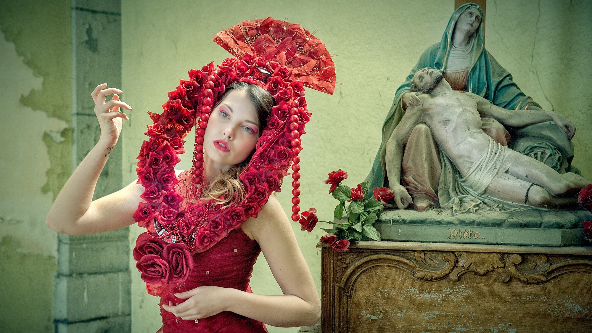 Midsection of woman wearing red flower photo