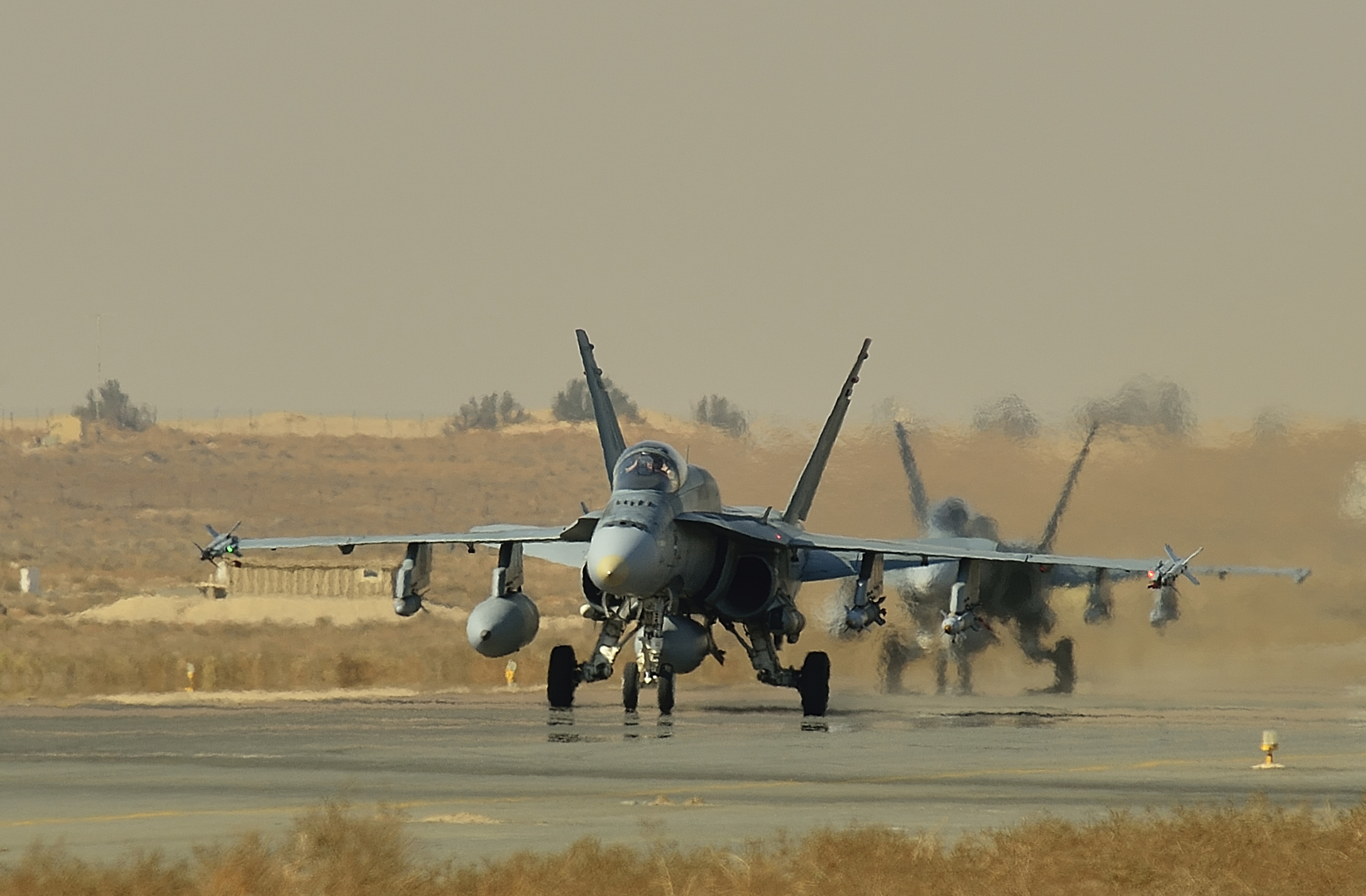 Royal Canadian Air Force CF-18 fighter jets taxi on the runway in ...