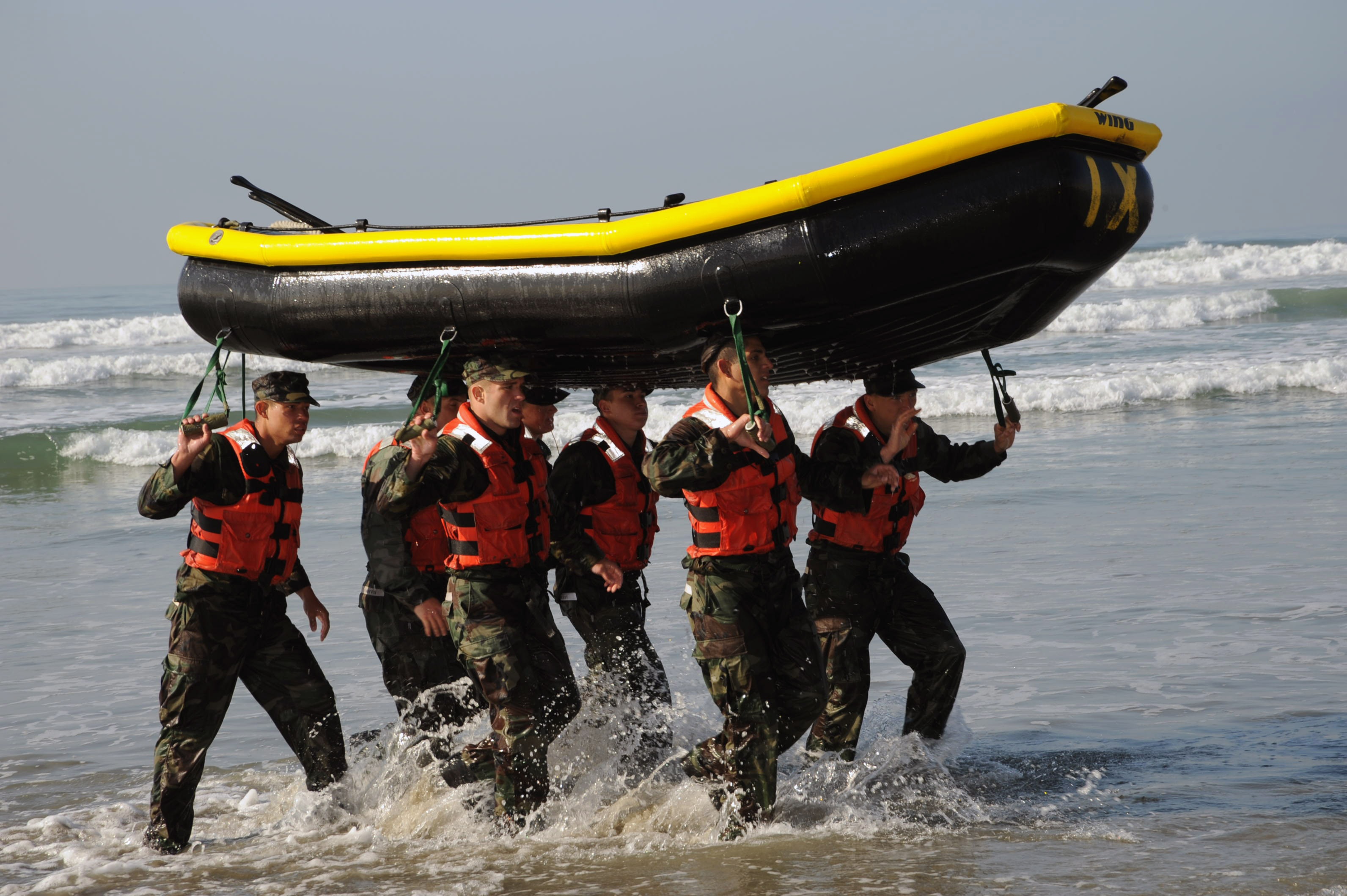 Military men on the shore photo