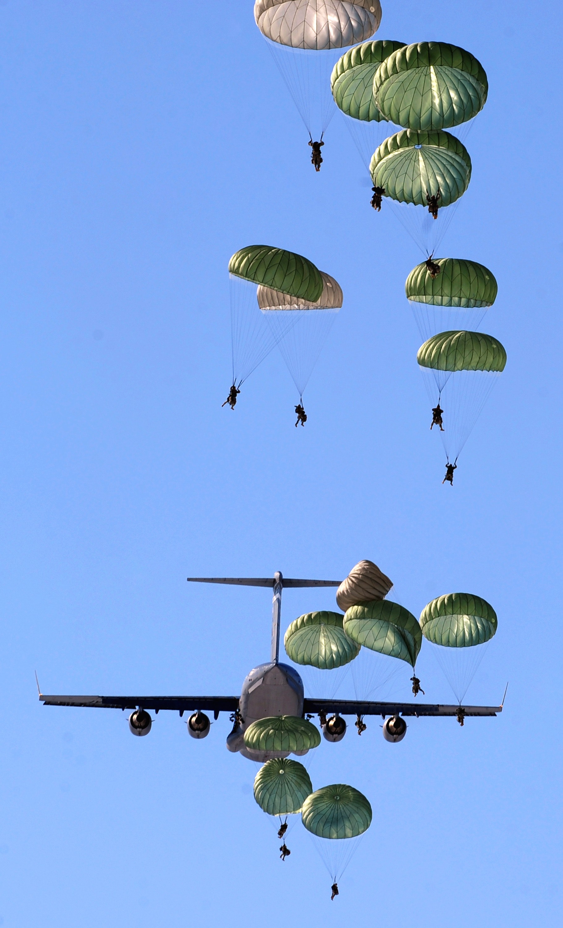 Army Paratroopers Practicing Parachute Drop from a Military Air ...