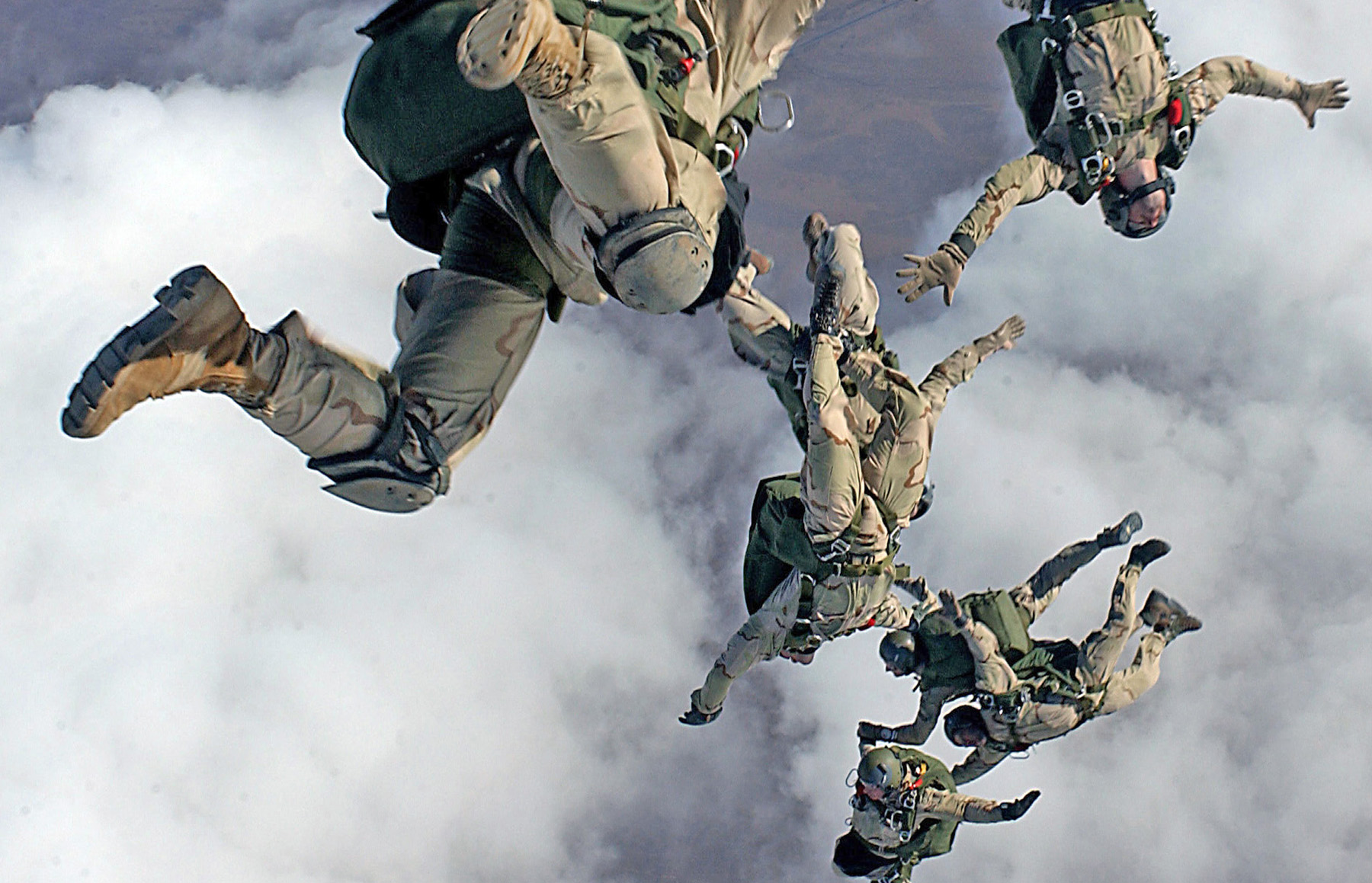 Stock Photography: Military Skydivers Jumping From a Plane