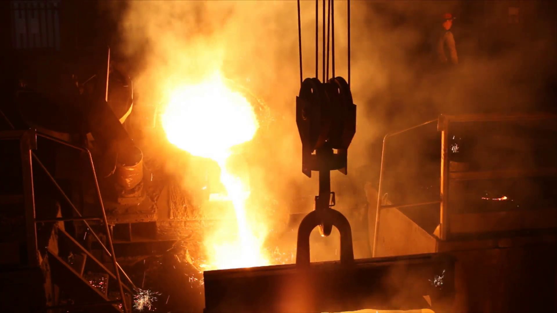 Hard work in the Foundry, liquid metal in the factory, molten metal ...