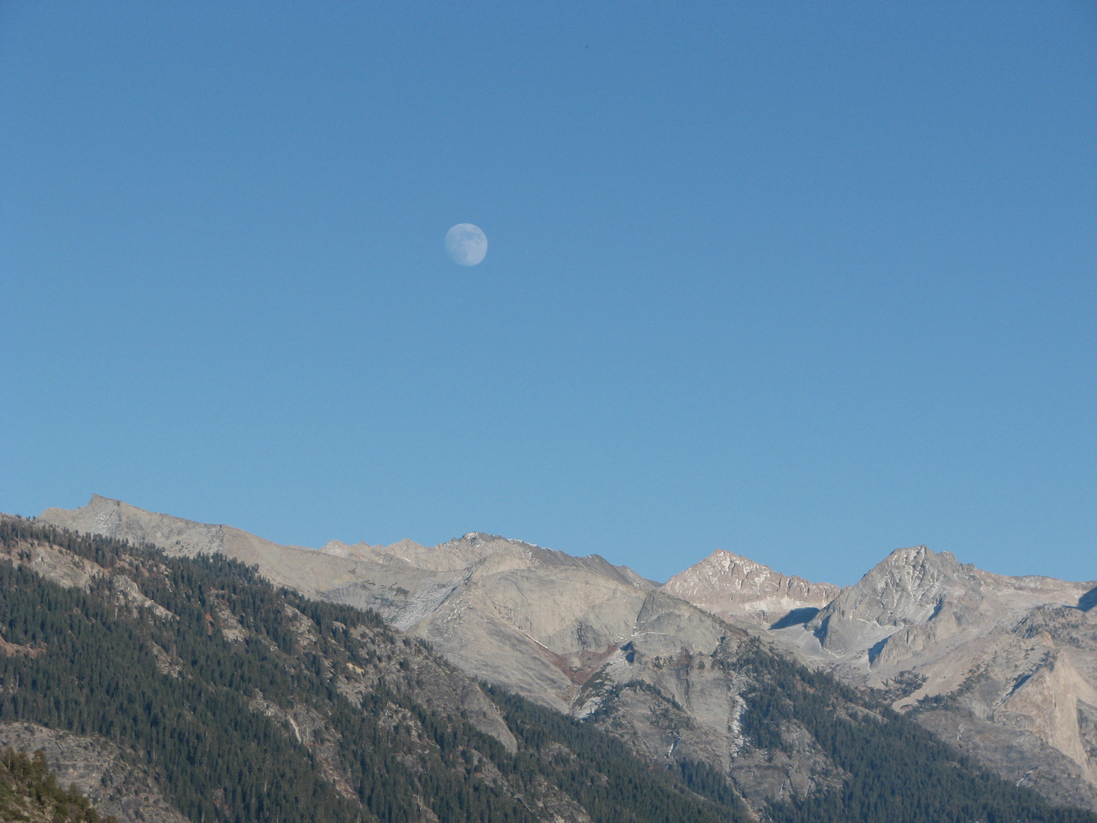 Moon over the mountains photo
