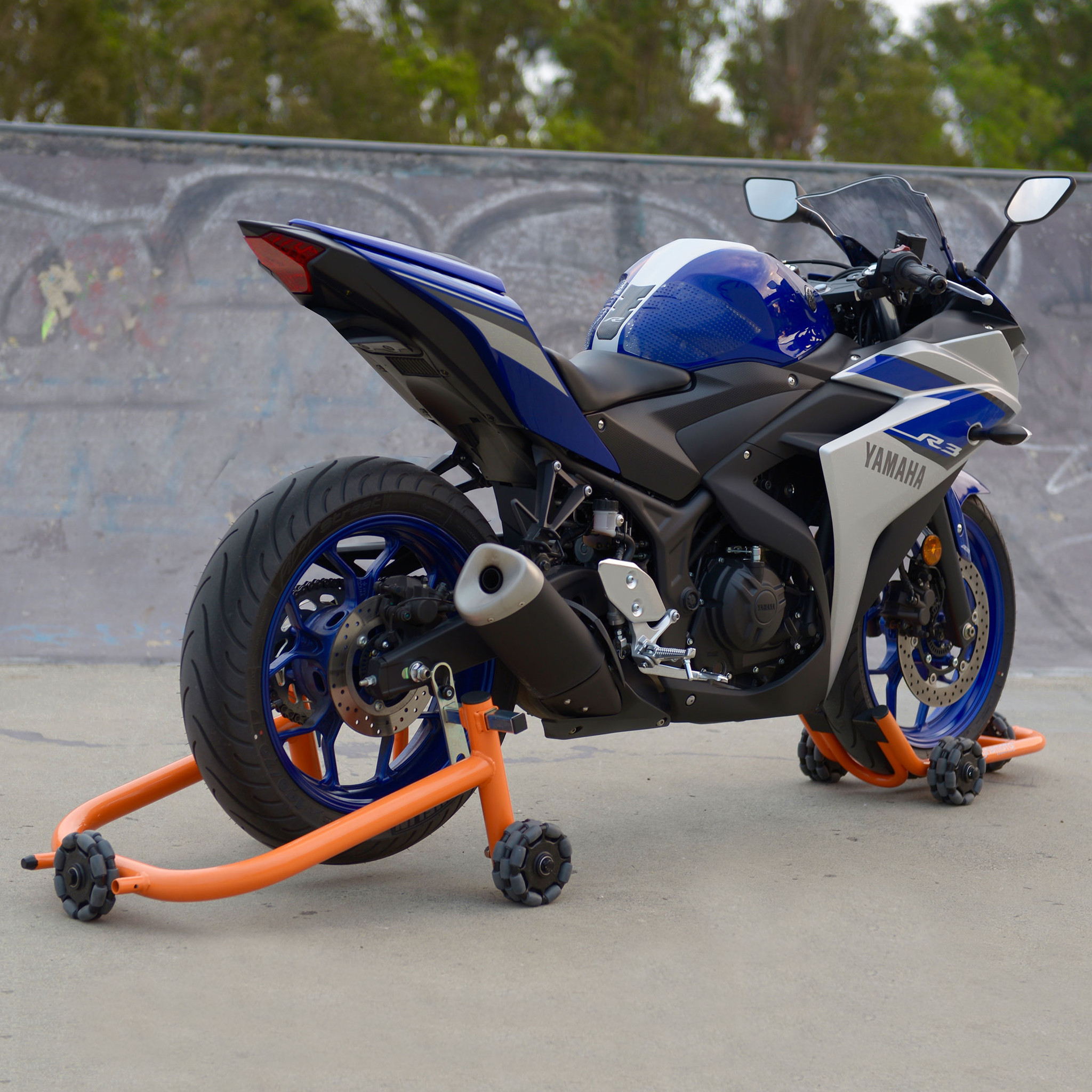 Omni-directional stand lets you easily move your motorcycle around ...