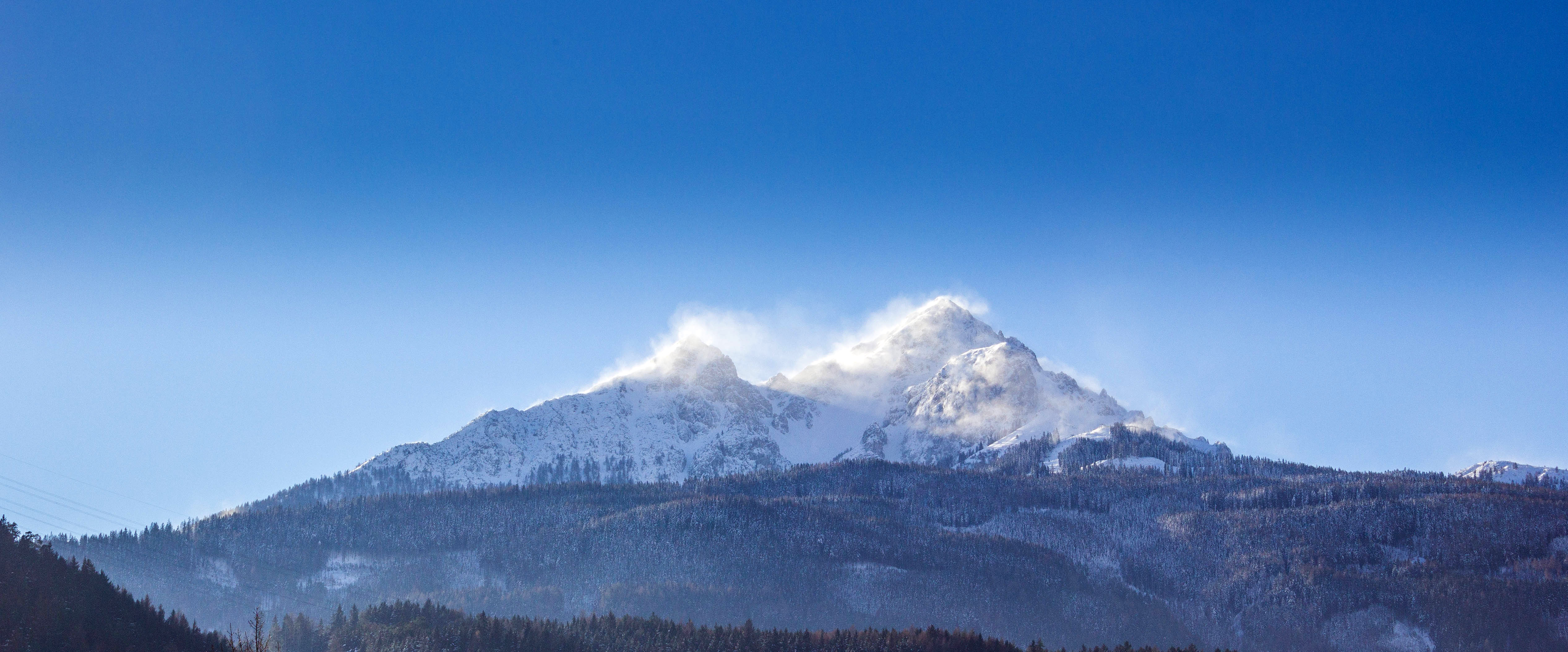 Snow capped mountain peaks in Steinbockweg Innsbruck, Austria image ...