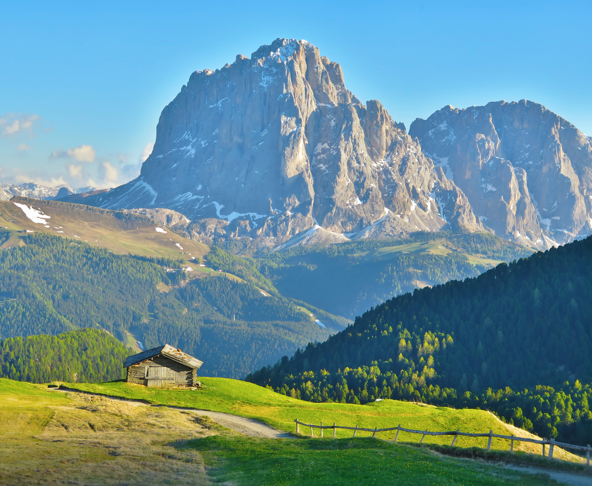 A simple hut and a grand mountain, an iconic view of Italy's ...