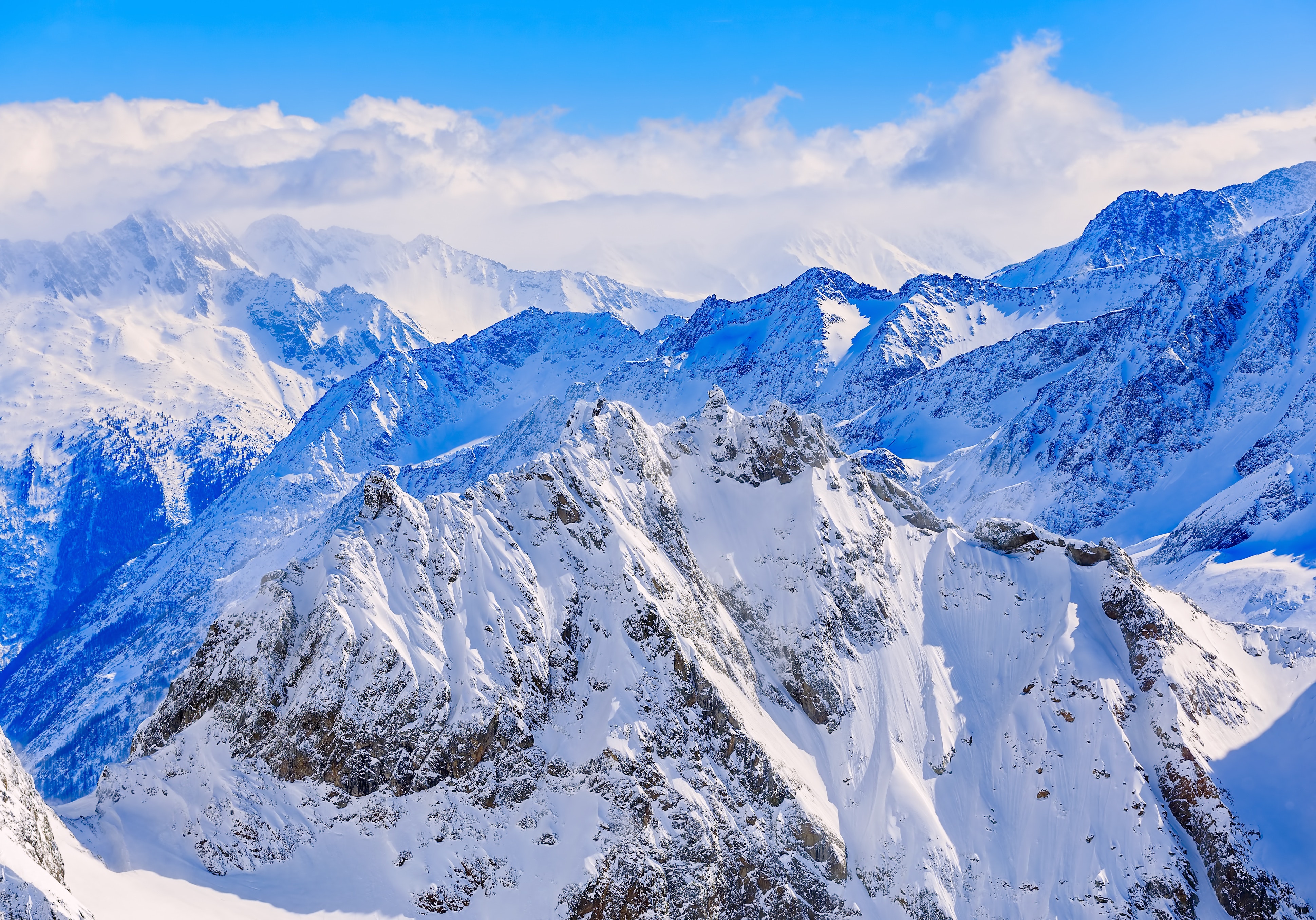 Mountain ranges covered in snow photo