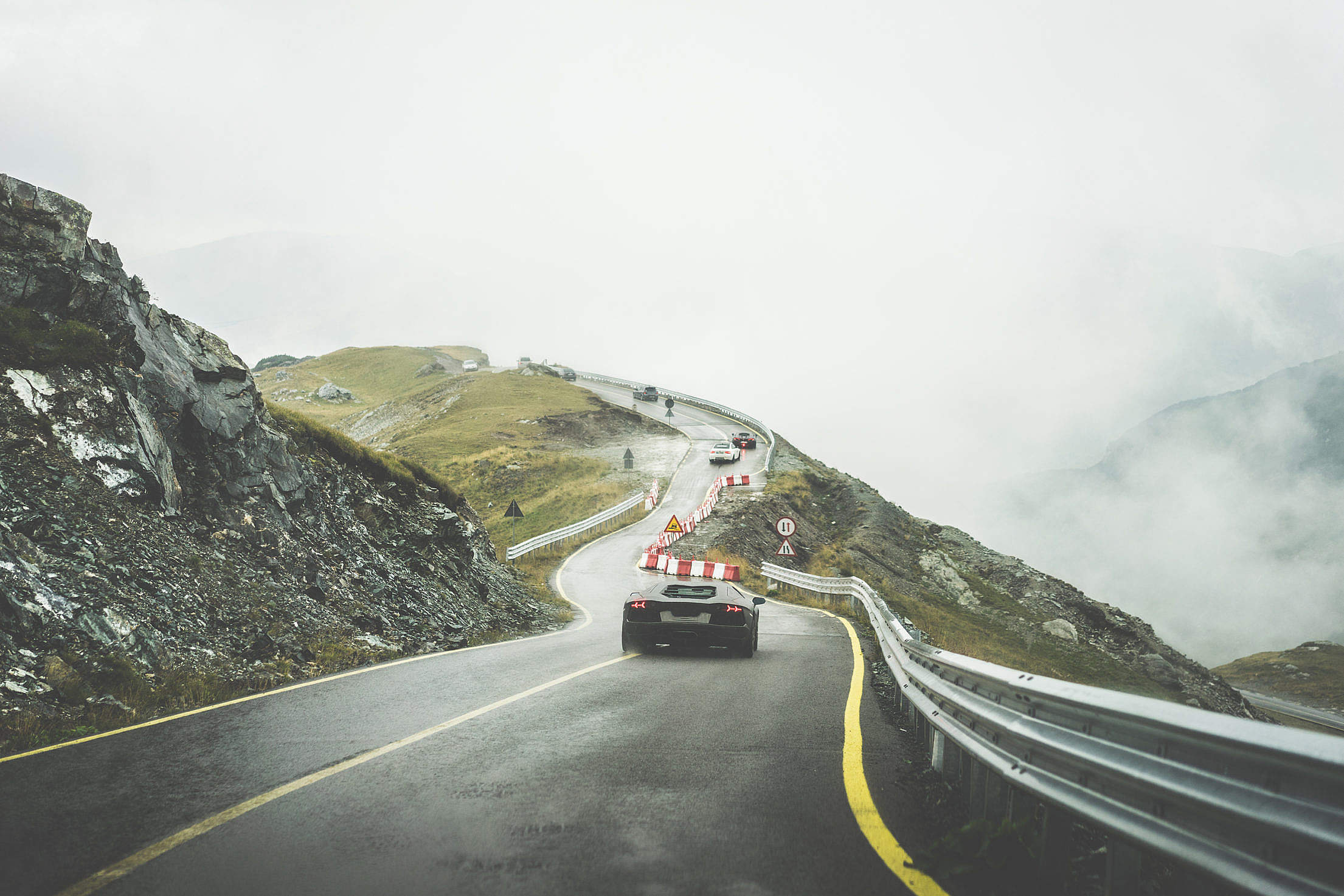 Sport Cars on Wet Mountain Road in Rainy Weather Free Stock Photo ...