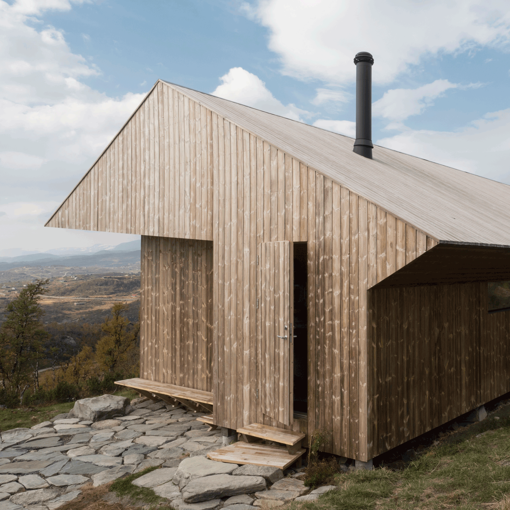 Jon Danielsen Aarhus creates pine-clad mountain cabin in Norway for ...