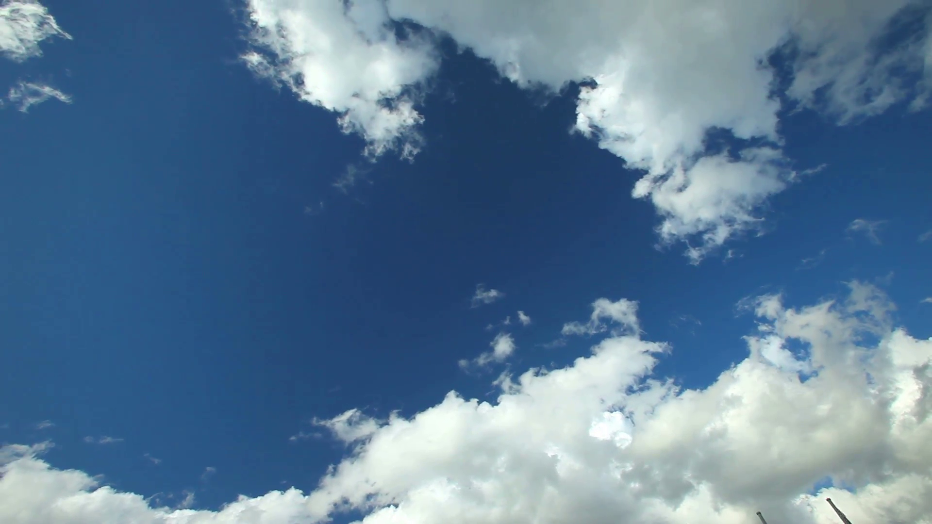 Timelapse of white fluffy clouds moving fast in the blue sky Stock ...