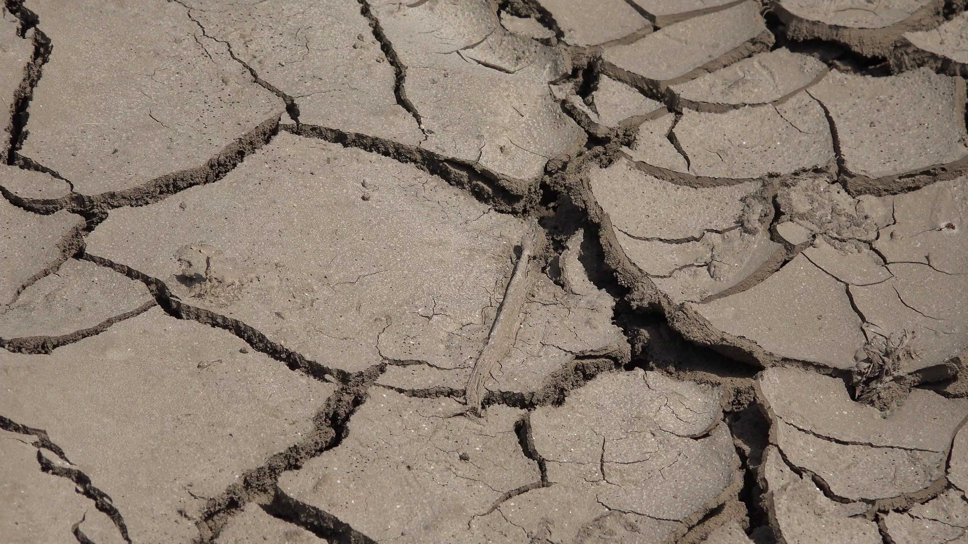 ULTRA HD 4K Closeup detail dry ground mud barren terrain concept ...