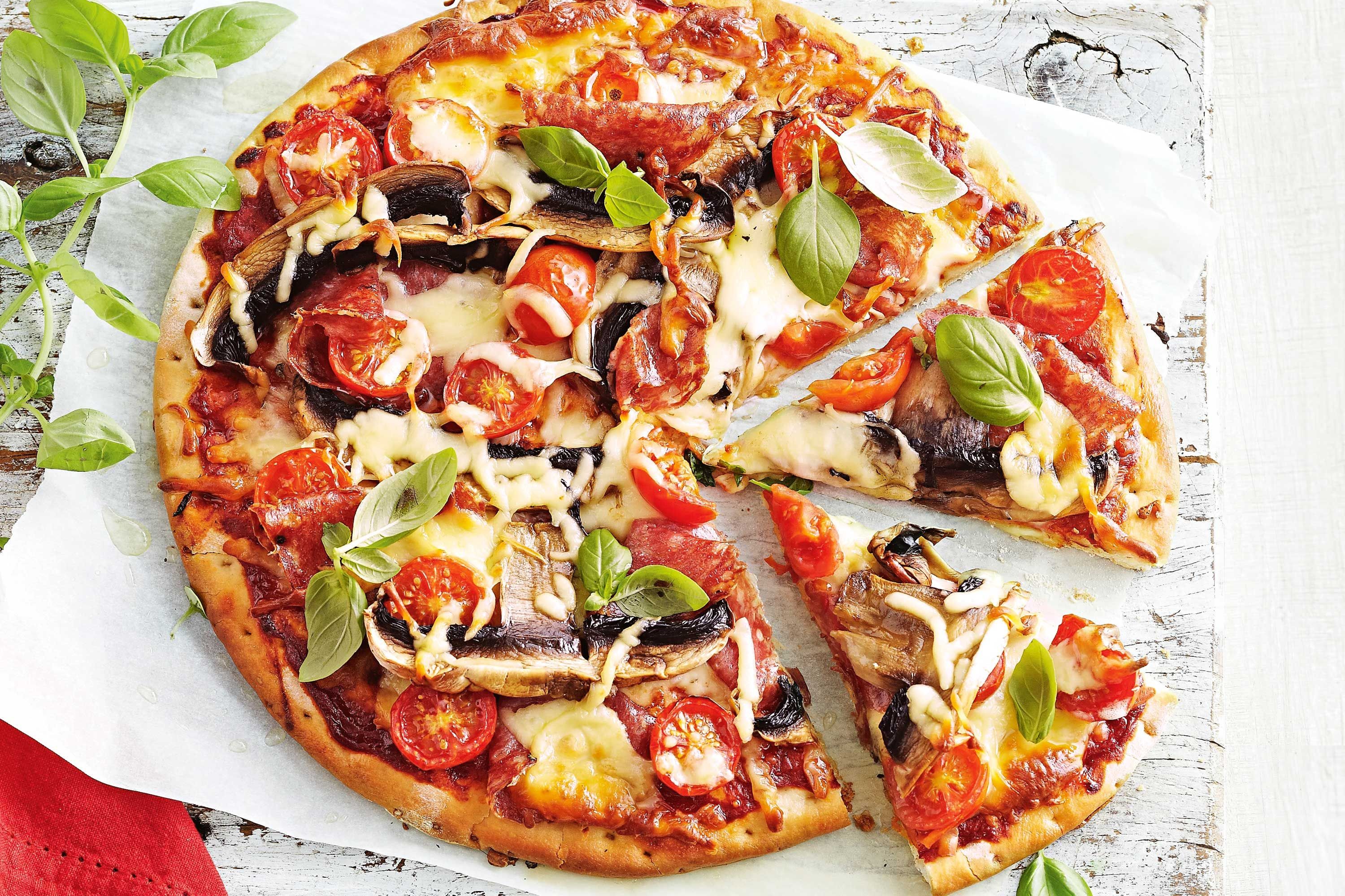 Easy, cheesy salami and mushroom pizza