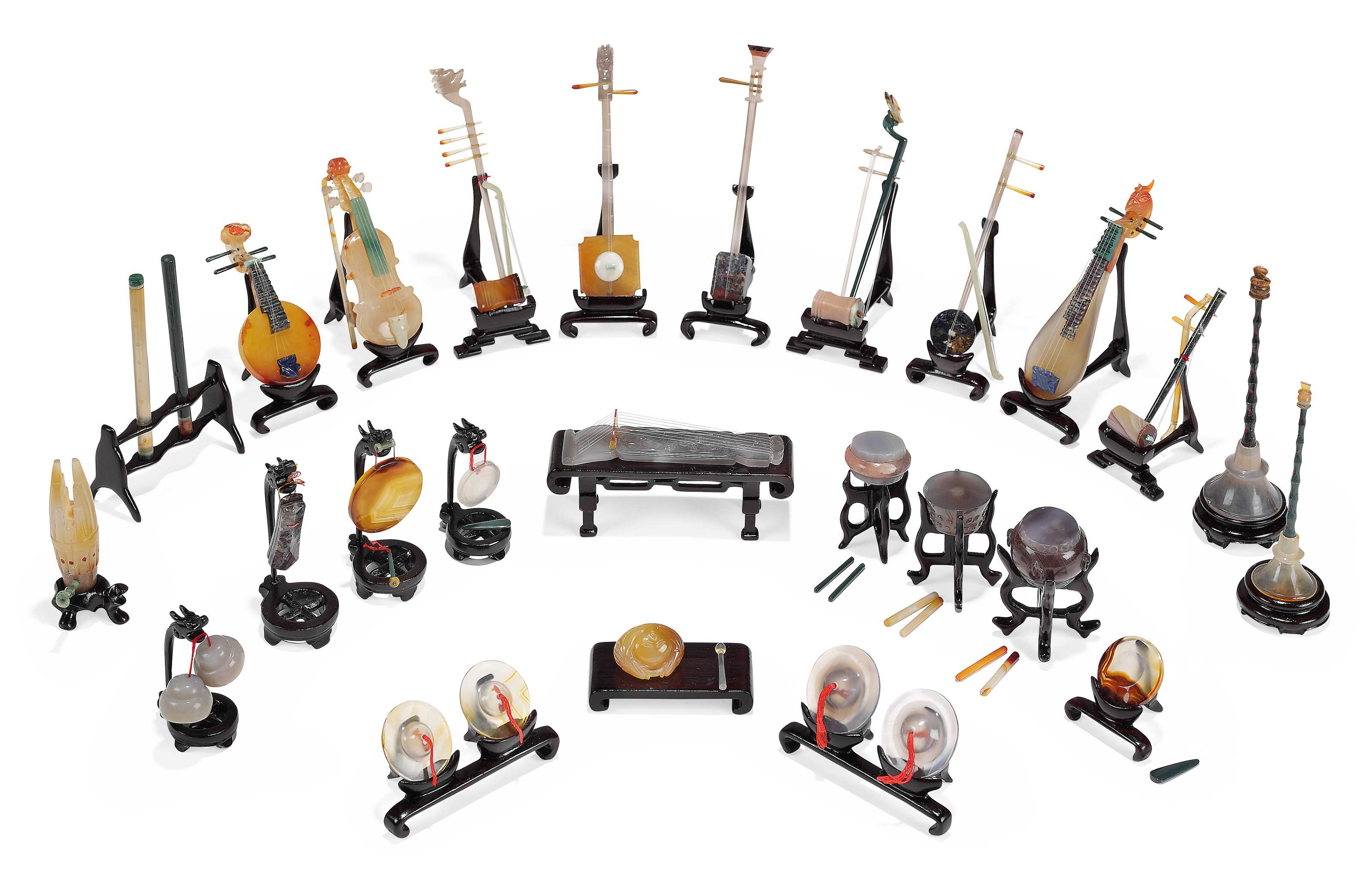 A COLLECTION OF TWENTY-SIX AGATE AND HARDSTONE MODELS OF MUSICAL ...