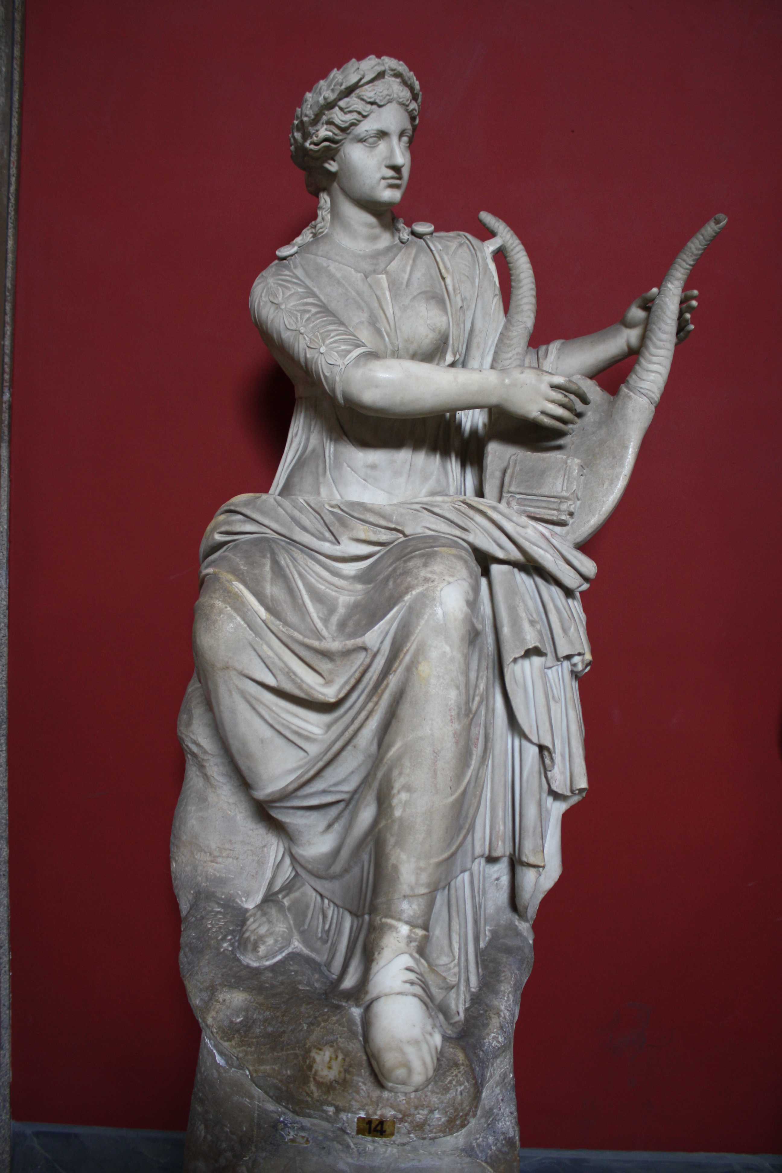 A Roman sculpture of Terpsichore, the Muse of Dance, playing a lyre ...