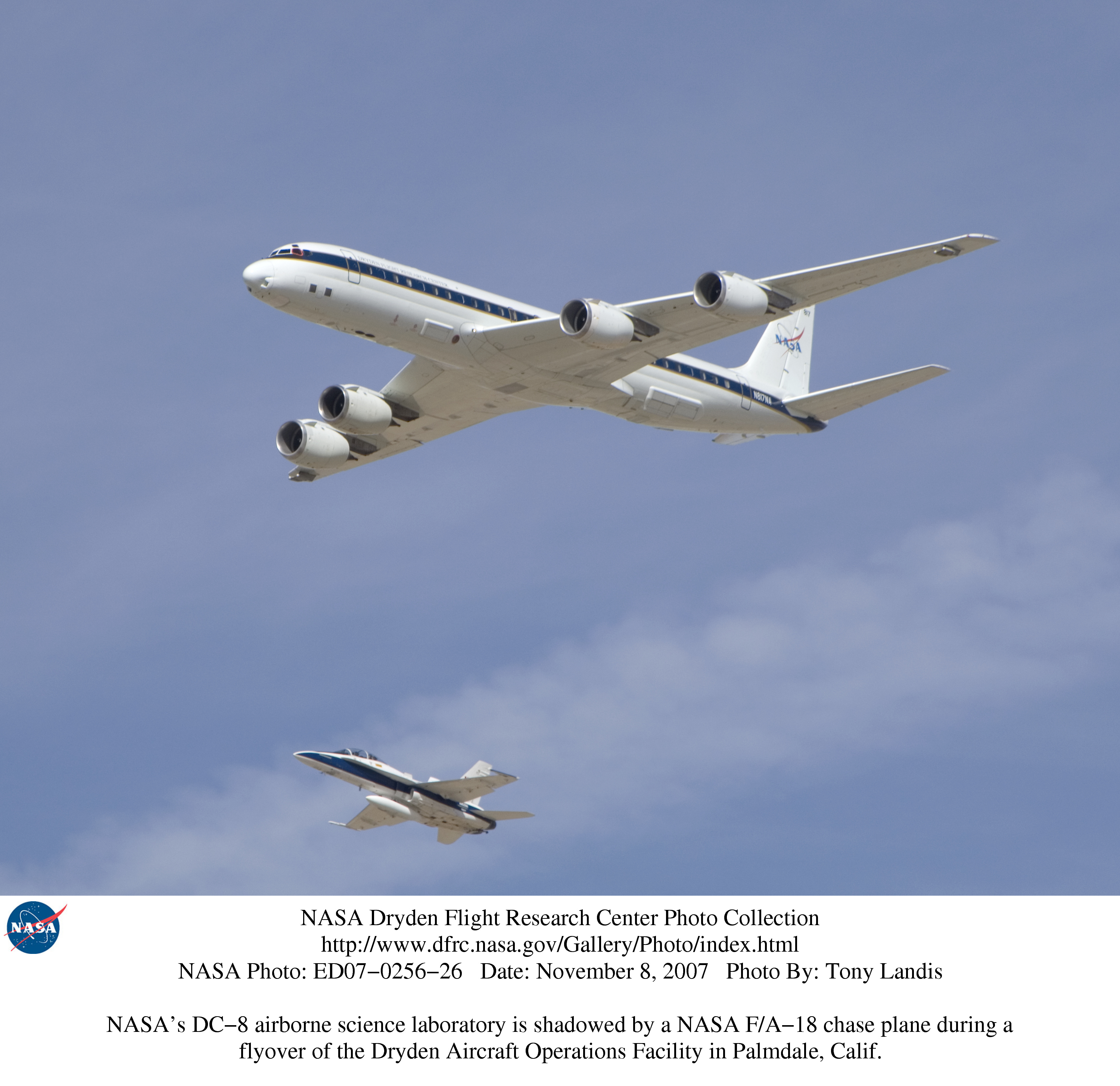 Nasa's dc-8 flying laboratory with a f/a-18 chase. photo