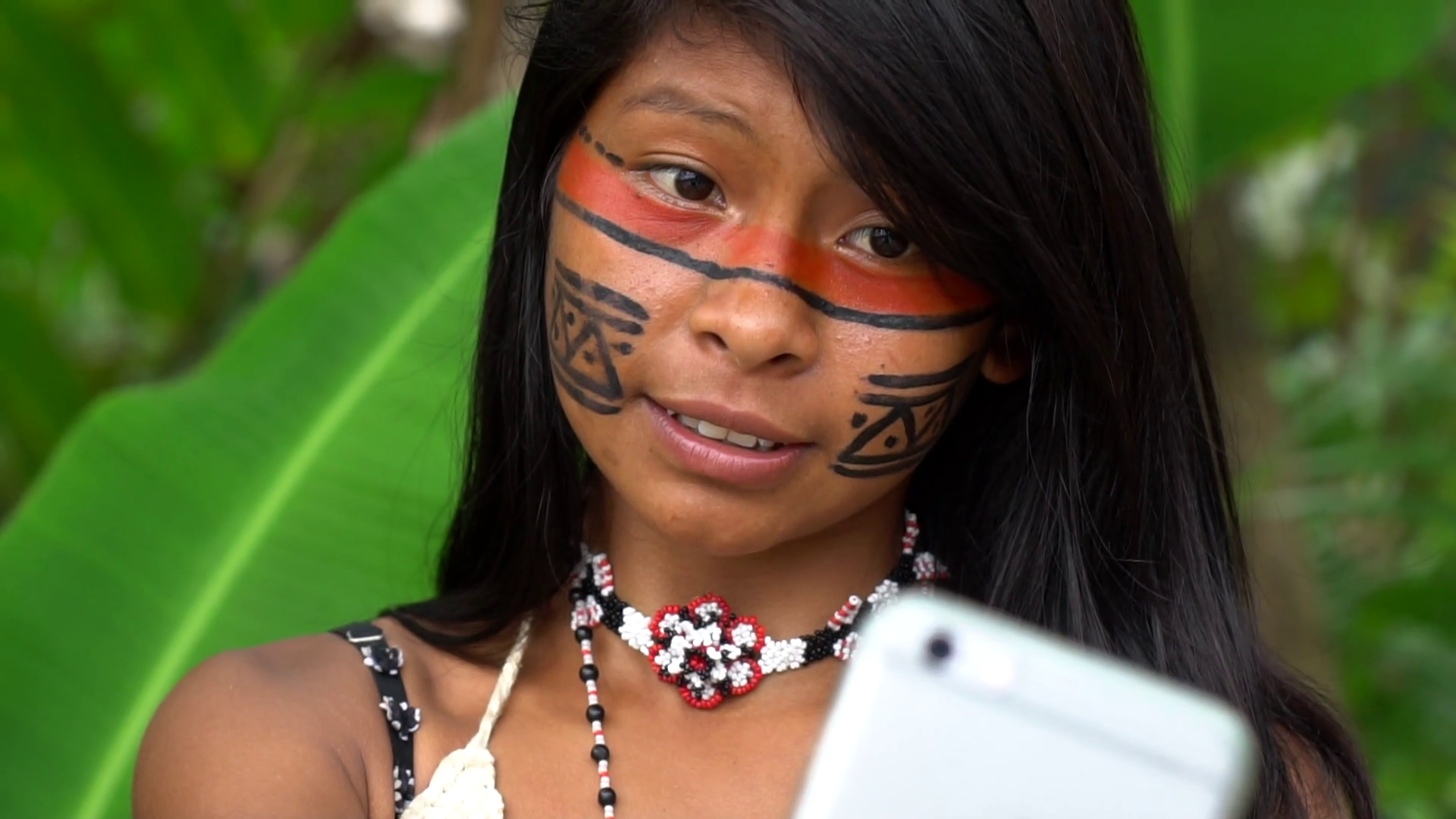 Native Brazilian girl from Tupi Guarani Tribe taking selfie photo ...