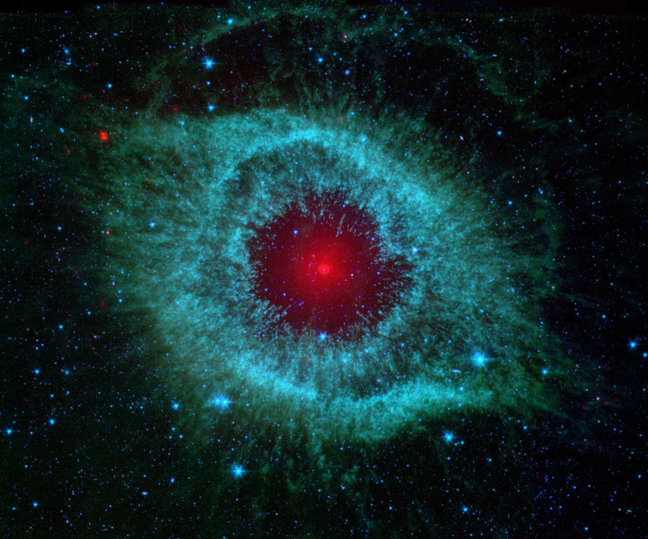 Space Images | Comets Kick up Dust in Helix Nebula