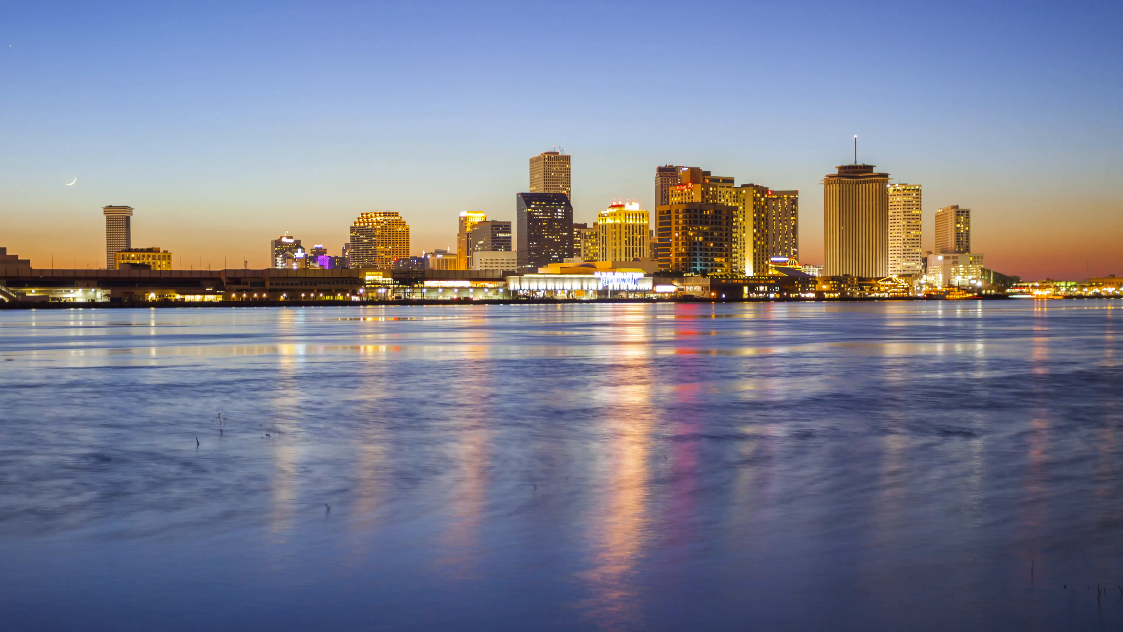 New Orleans City Skyline Across the Mississippi River - Day to Night ...